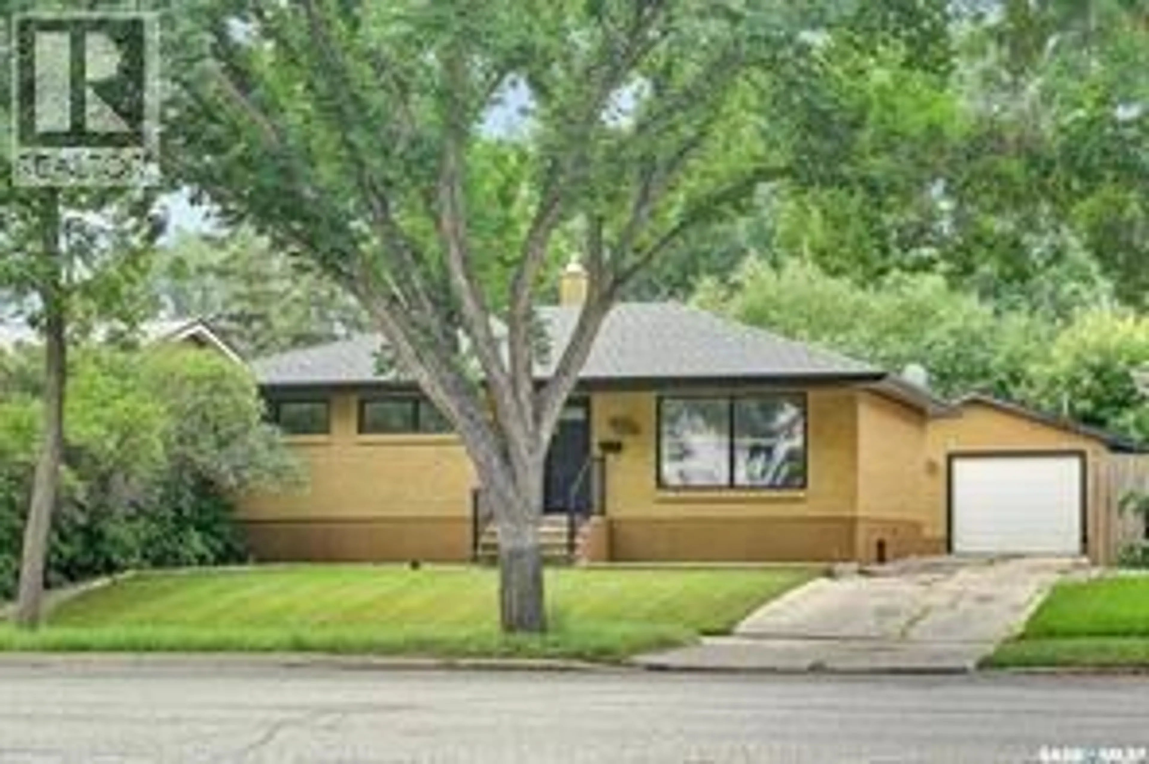 Home with vinyl exterior material, street for 4515 SHERWOOD DRIVE, Regina Saskatchewan S4R4B3