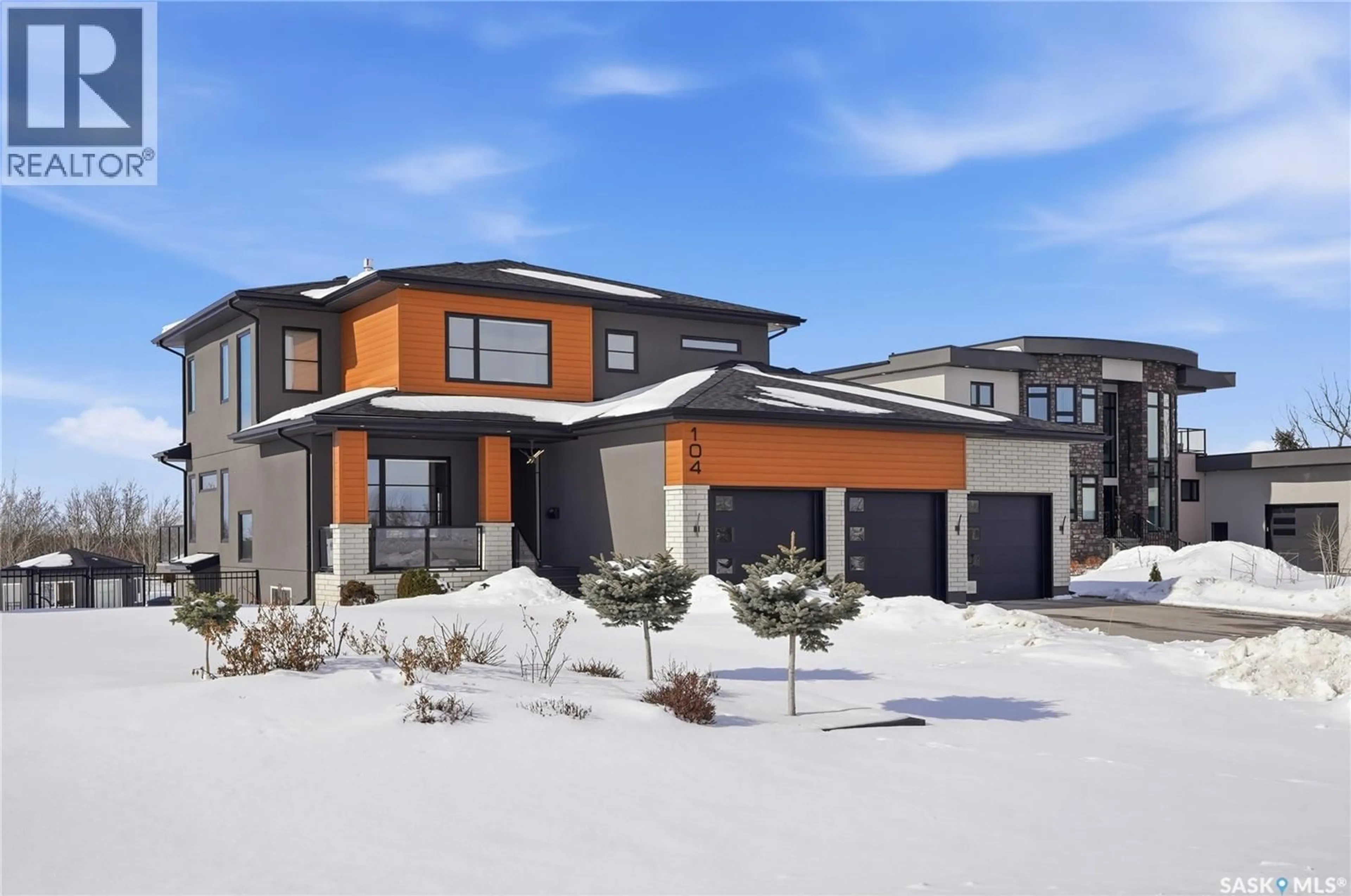 Home with brick exterior material, street for 104 GREENBRYRE LANE, Corman Park Rm No. 344 Saskatchewan S7V0J6