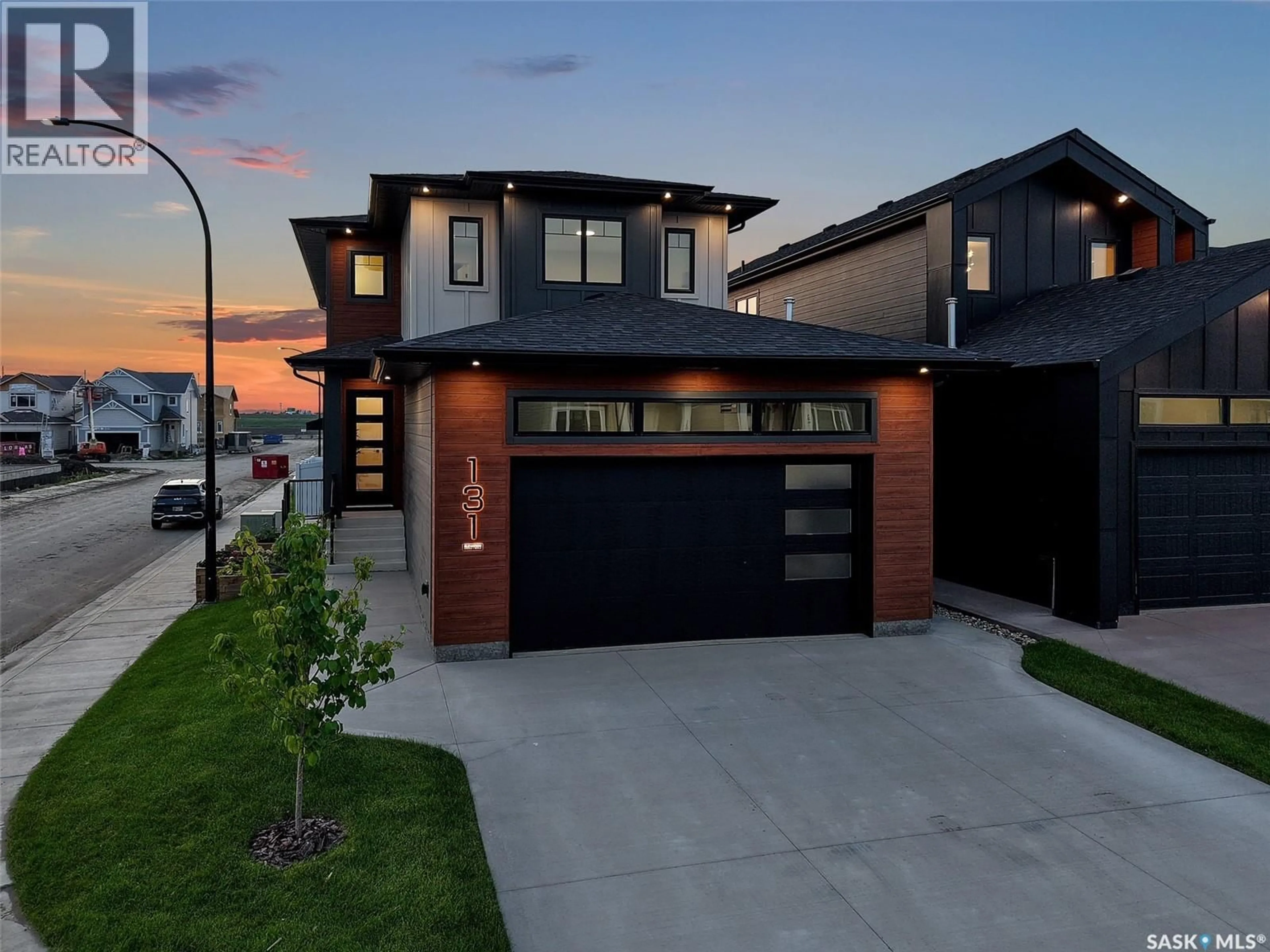 Home with brick exterior material, street for 131 ASOKAN STREET, Saskatoon Saskatchewan S7V1V9