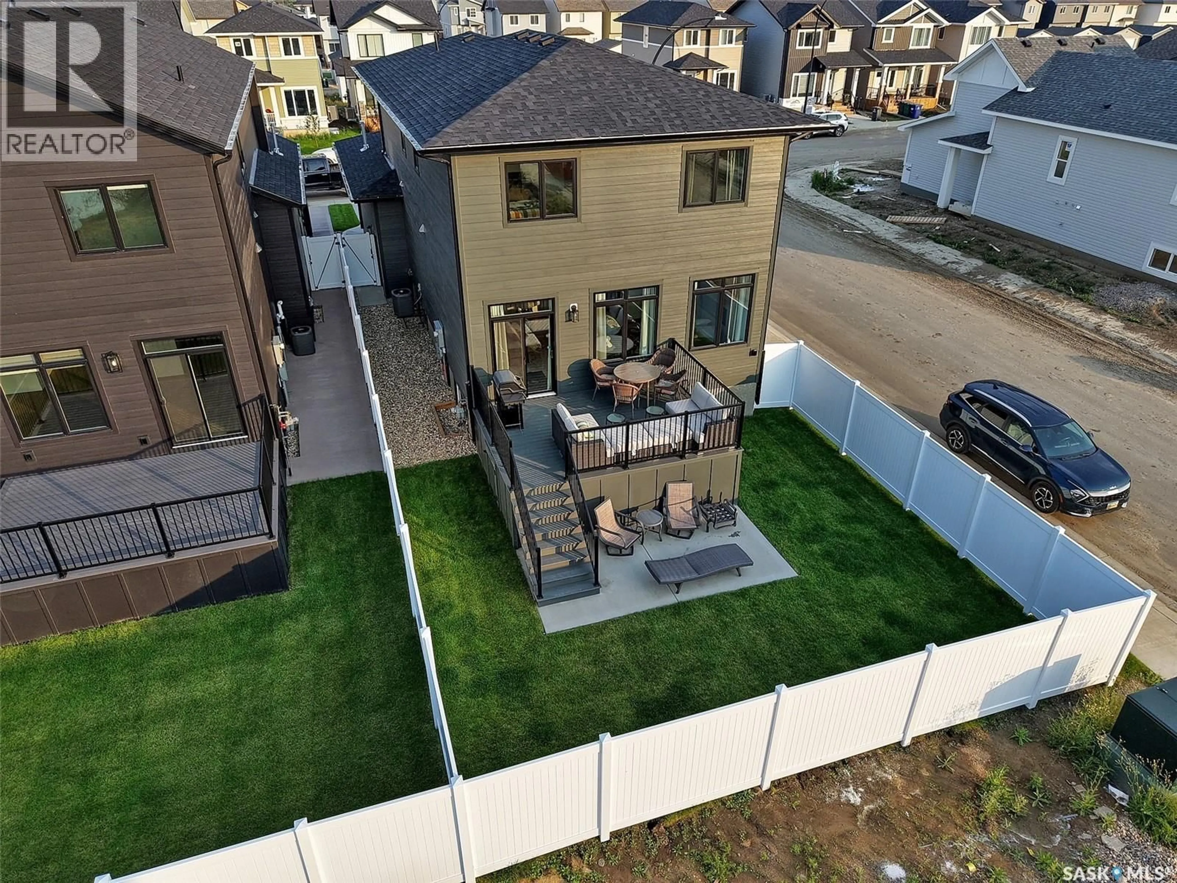 A pic from outside/outdoor area/front of a property/back of a property/a pic from drone, mountain view for 131 ASOKAN STREET, Saskatoon Saskatchewan S7V1V9