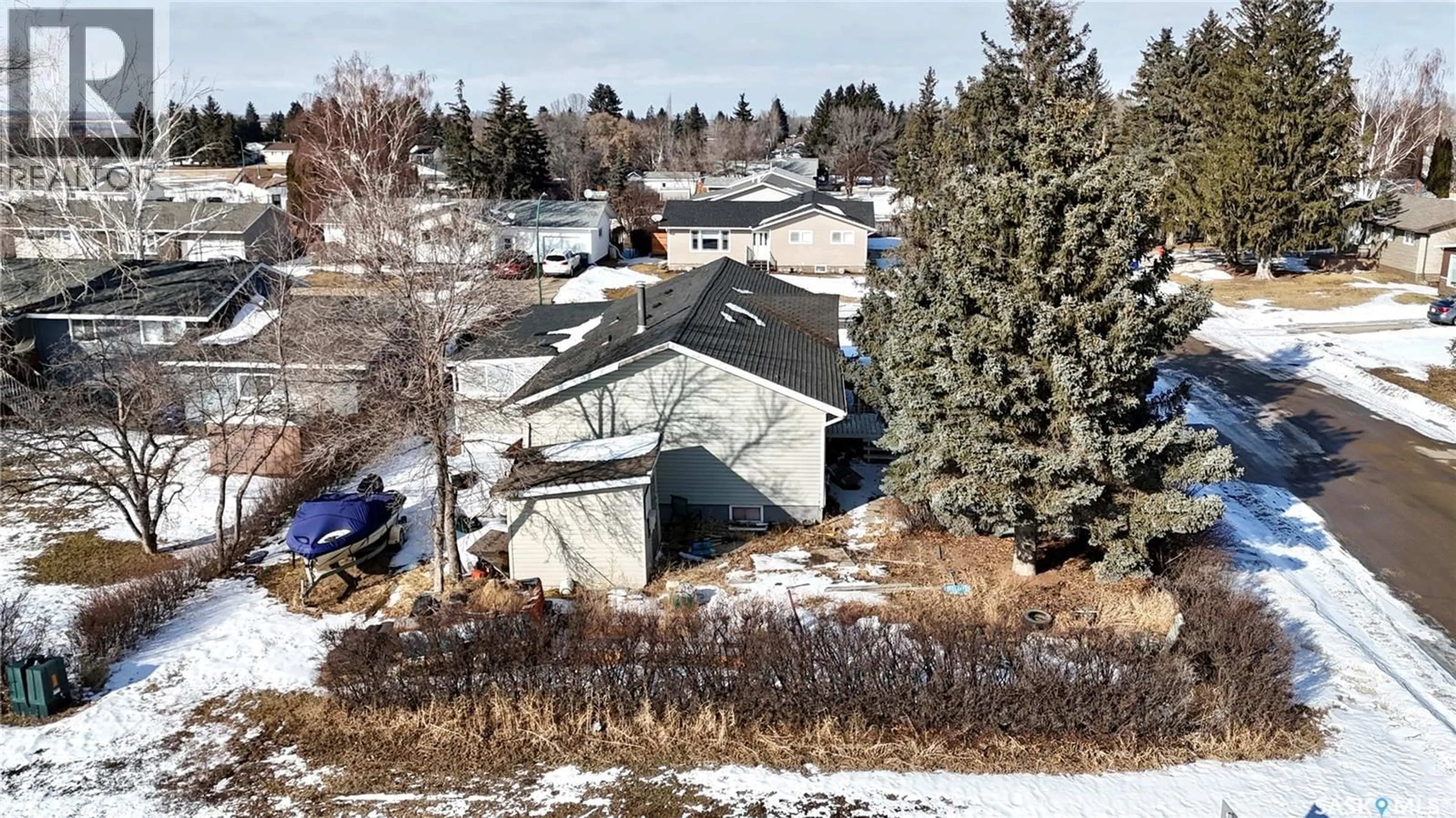 A pic from outside/outdoor area/front of a property/back of a property/a pic from drone, mountain view for 56 TUFTS CRESCENT, Outlook Saskatchewan S0L2N0