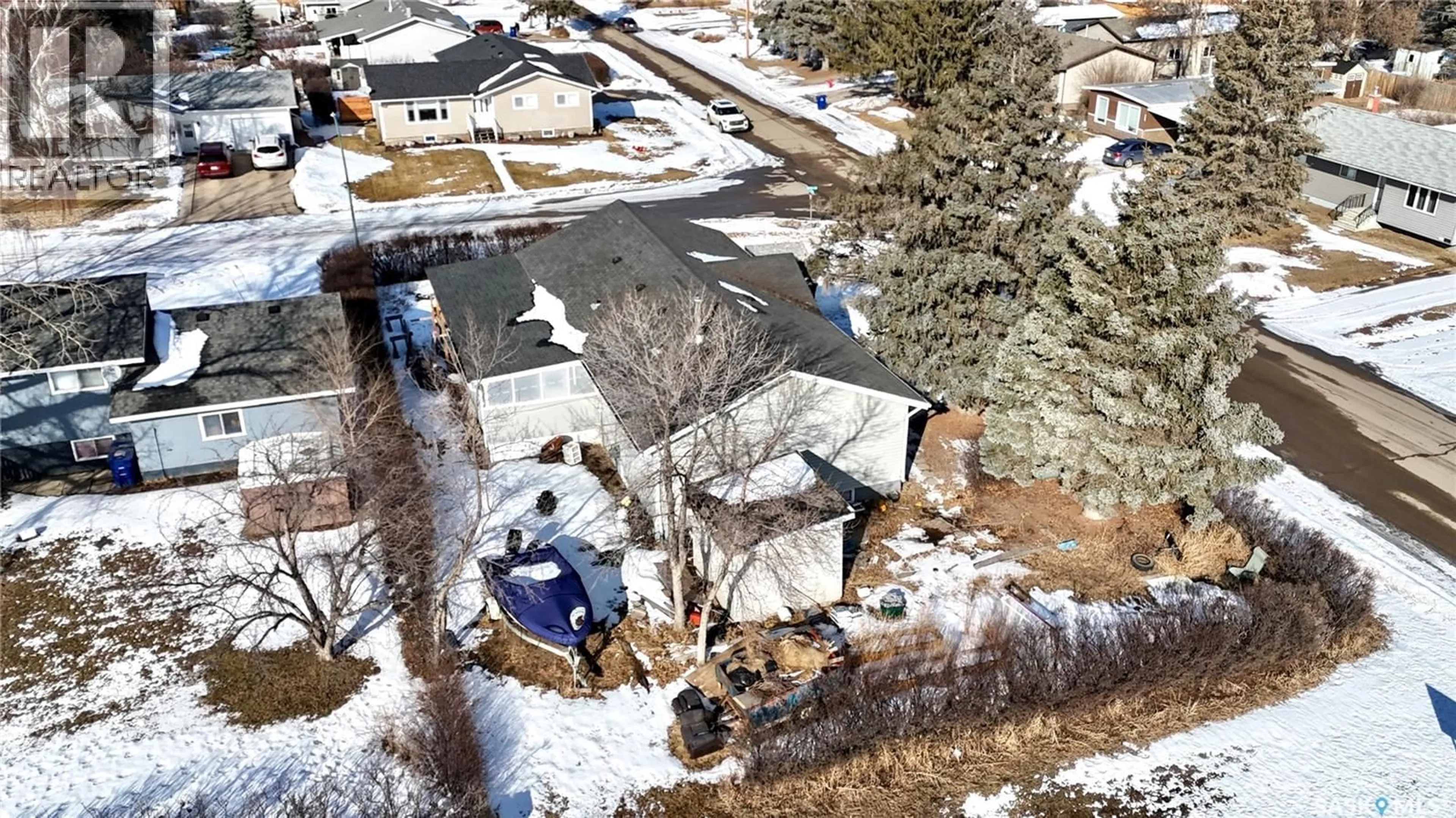 A pic from outside/outdoor area/front of a property/back of a property/a pic from drone, street for 56 TUFTS CRESCENT, Outlook Saskatchewan S0L2N0