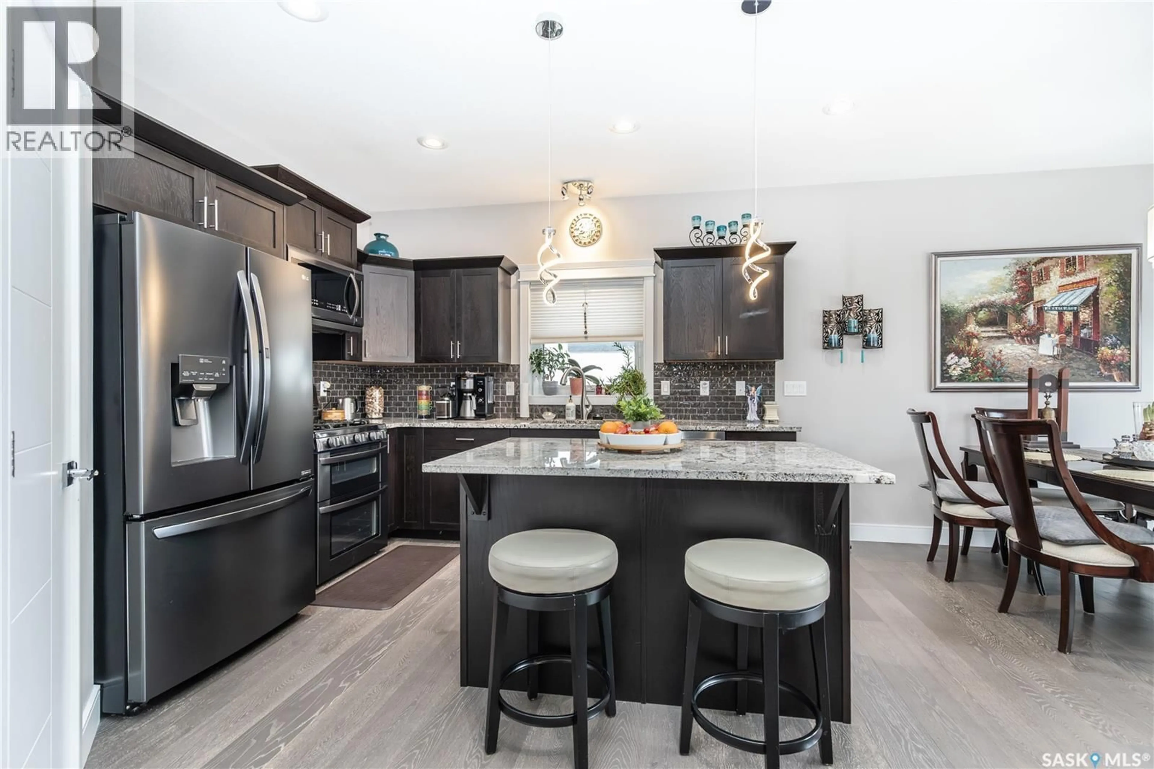 Contemporary kitchen, ceramic/tile floor for 670 ATTON CRESCENT, Saskatoon Saskatchewan S7W0K5