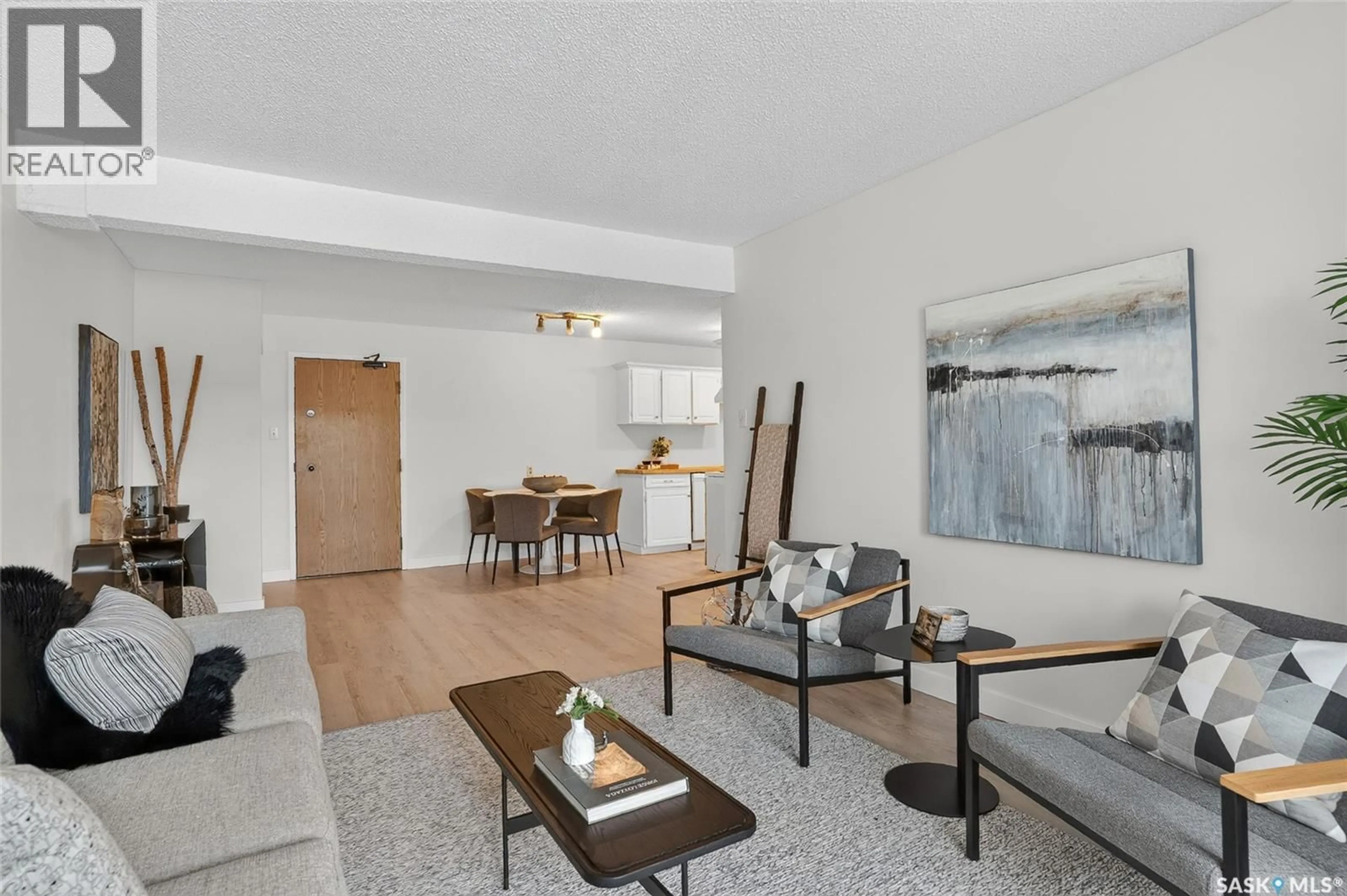 Living room with furniture, unknown for 208 311 TAIT CRESCENT, Saskatoon Saskatchewan S7H5L6