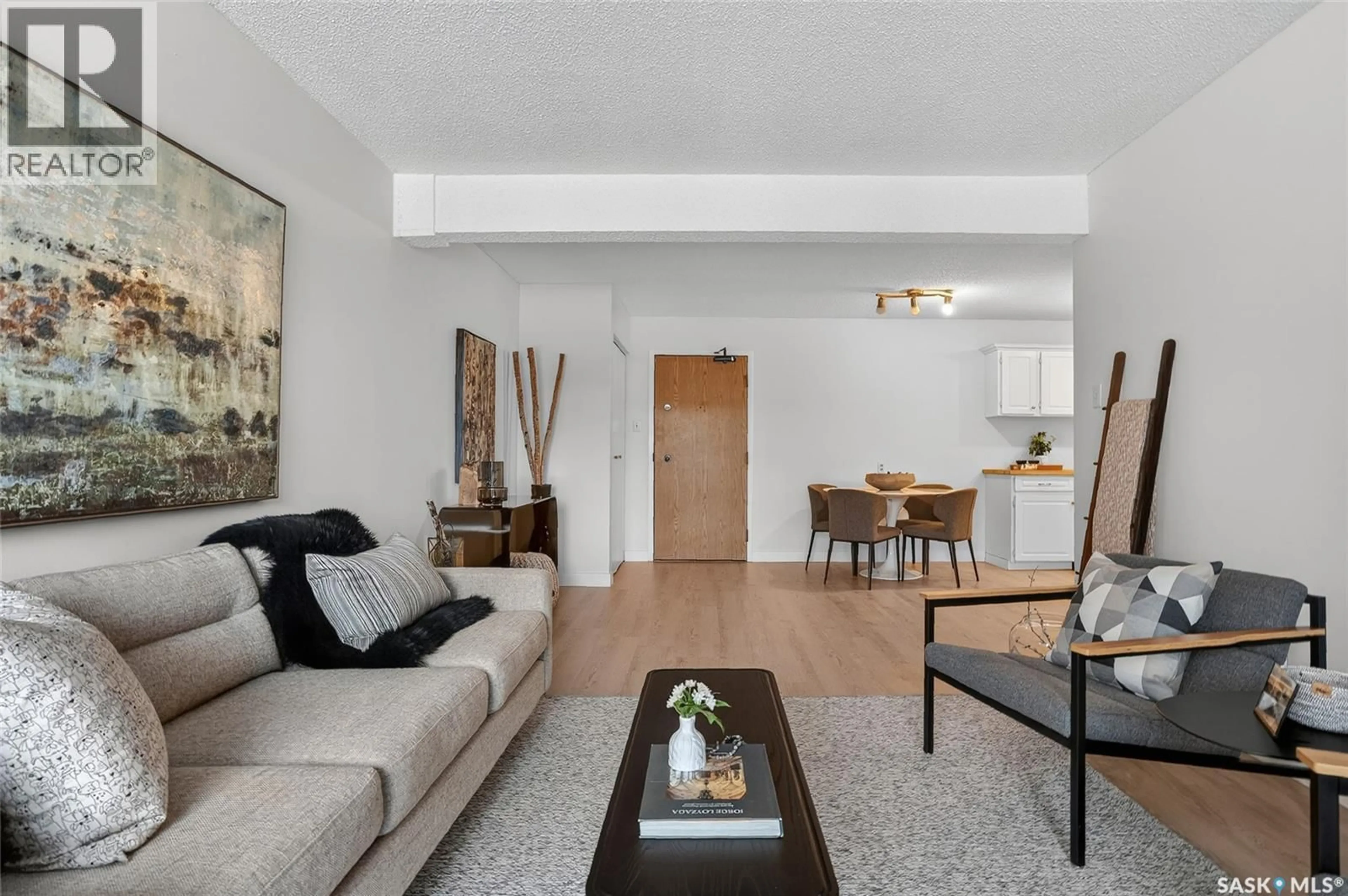 Living room with furniture, unknown for 208 311 TAIT CRESCENT, Saskatoon Saskatchewan S7H5L6