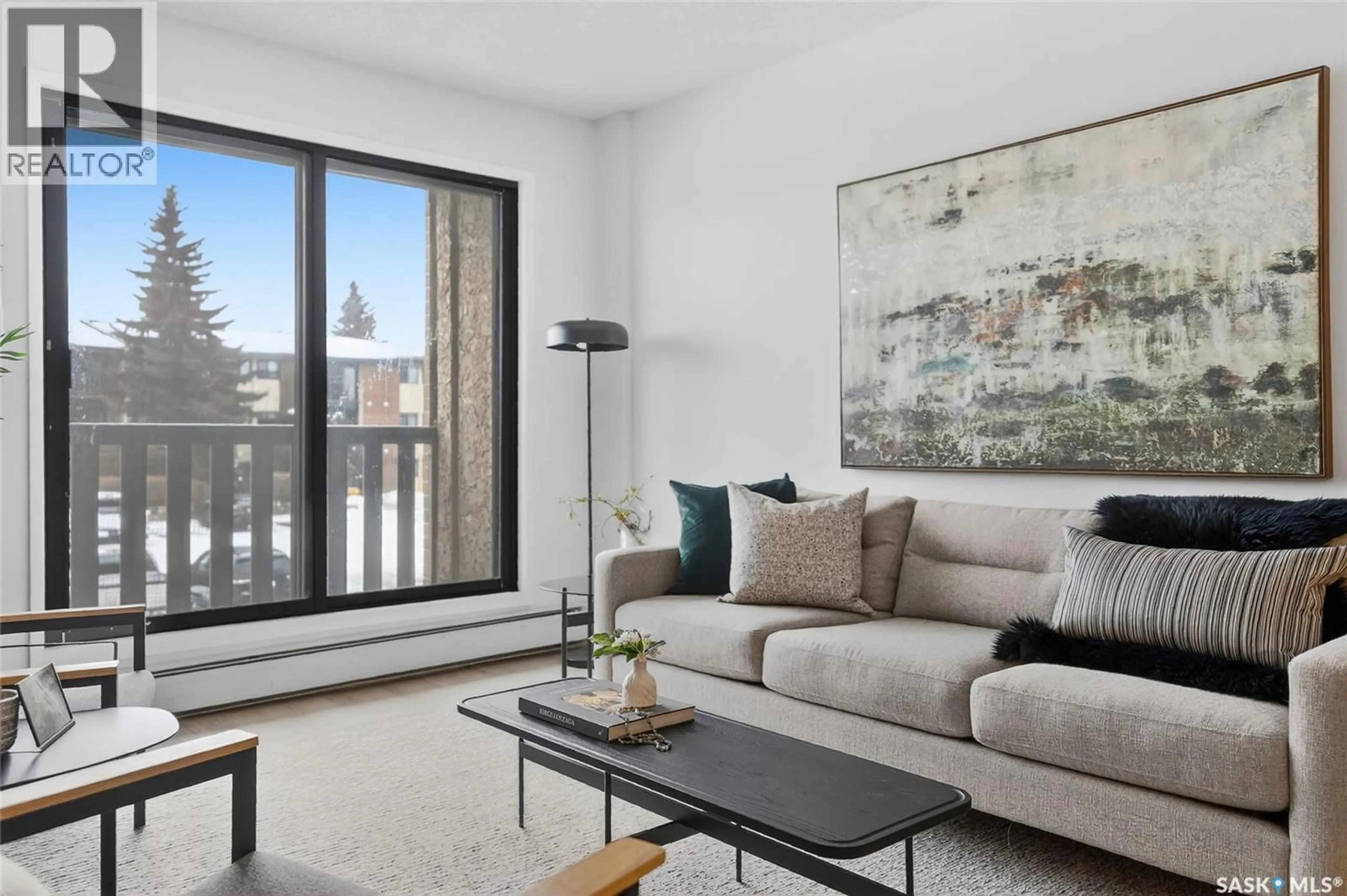 Living room with furniture, unknown for 208 311 TAIT CRESCENT, Saskatoon Saskatchewan S7H5L6