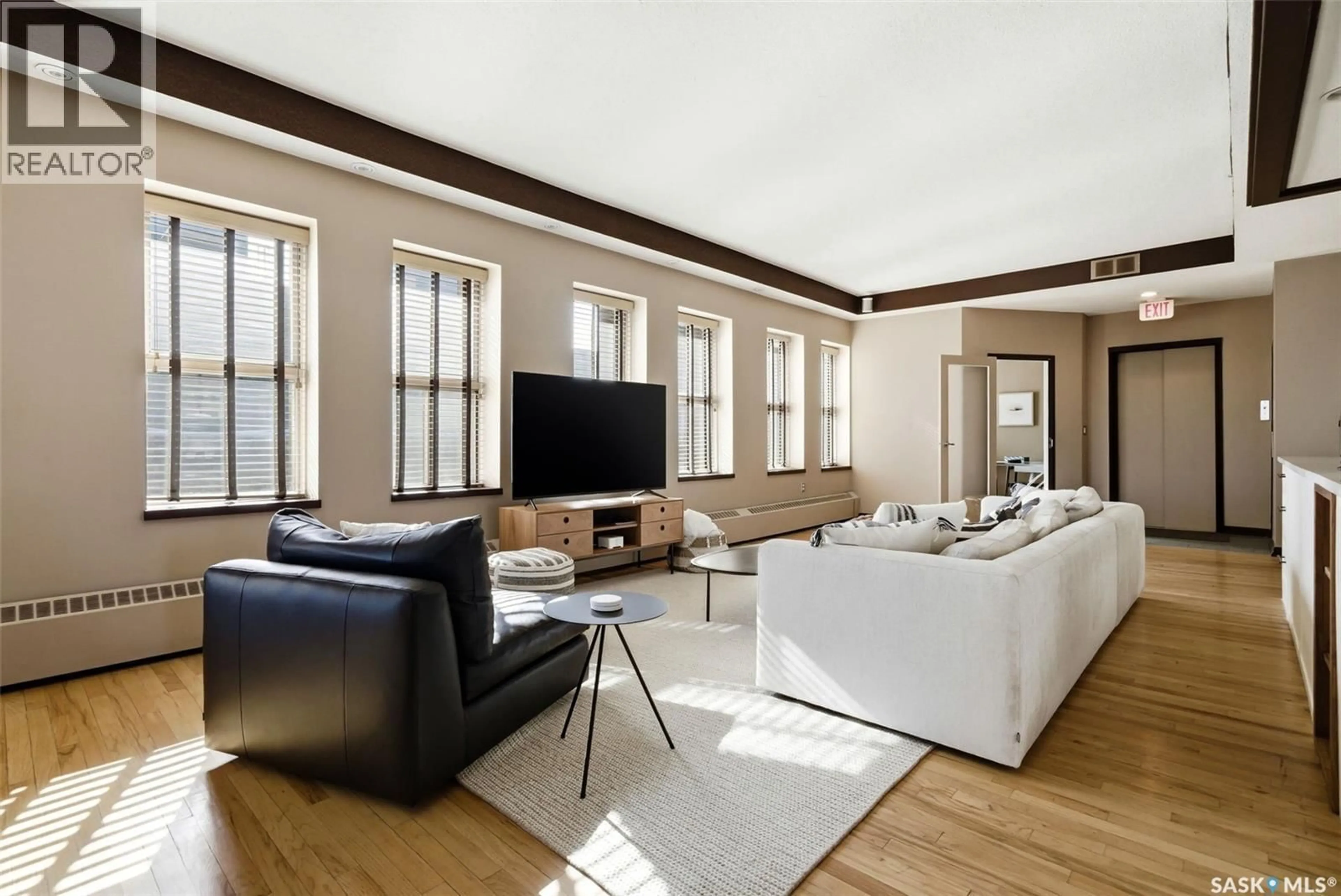 Living room with furniture, unknown for 500 2020 11TH AVENUE, Regina Saskatchewan S4P0J3