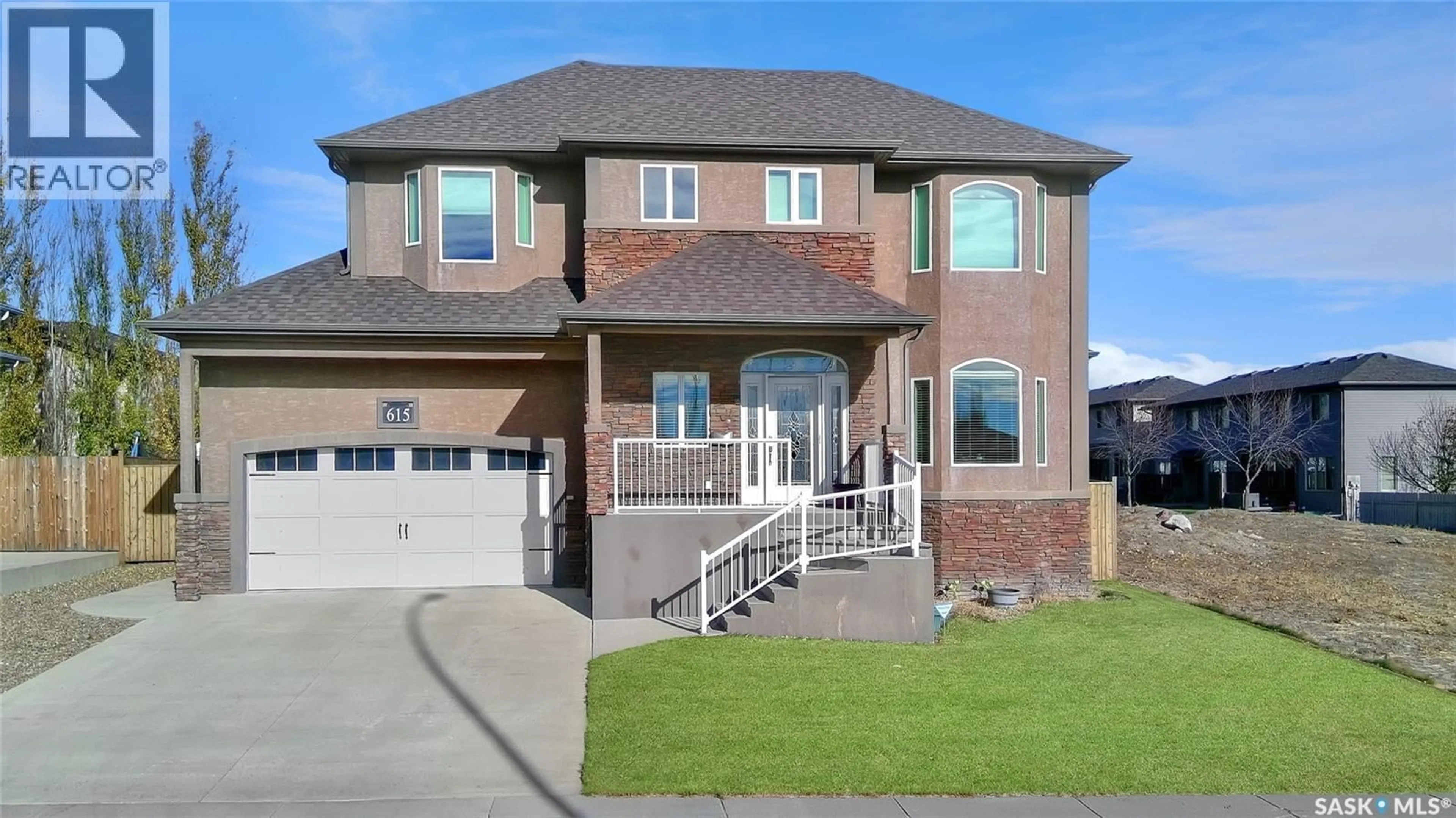 Home with brick exterior material, street for 615 HODGSON DRIVE, Swift Current Saskatchewan S9H0B4