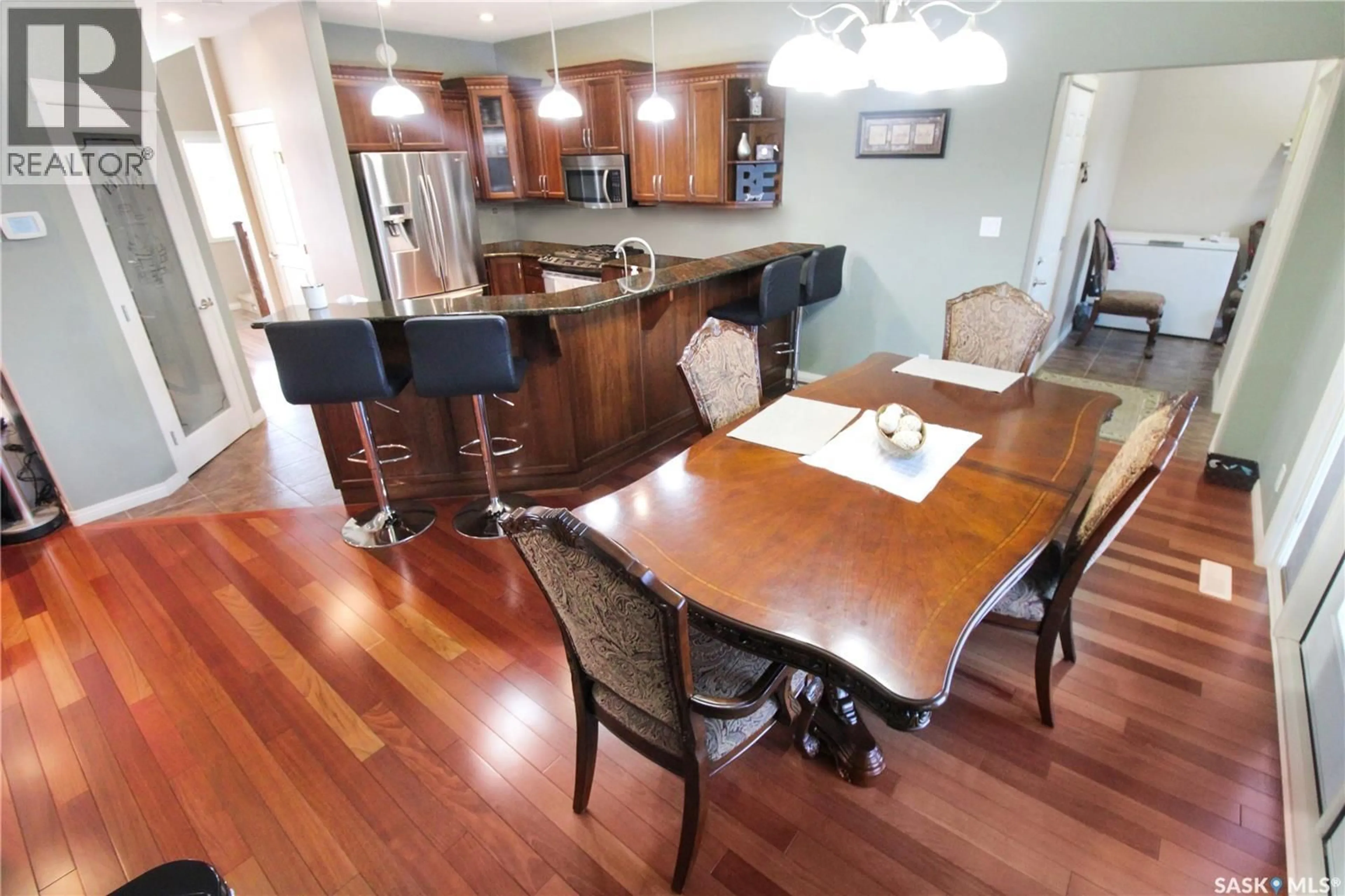 Dining room, wood/laminate floor for 615 HODGSON DRIVE, Swift Current Saskatchewan S9H0B4