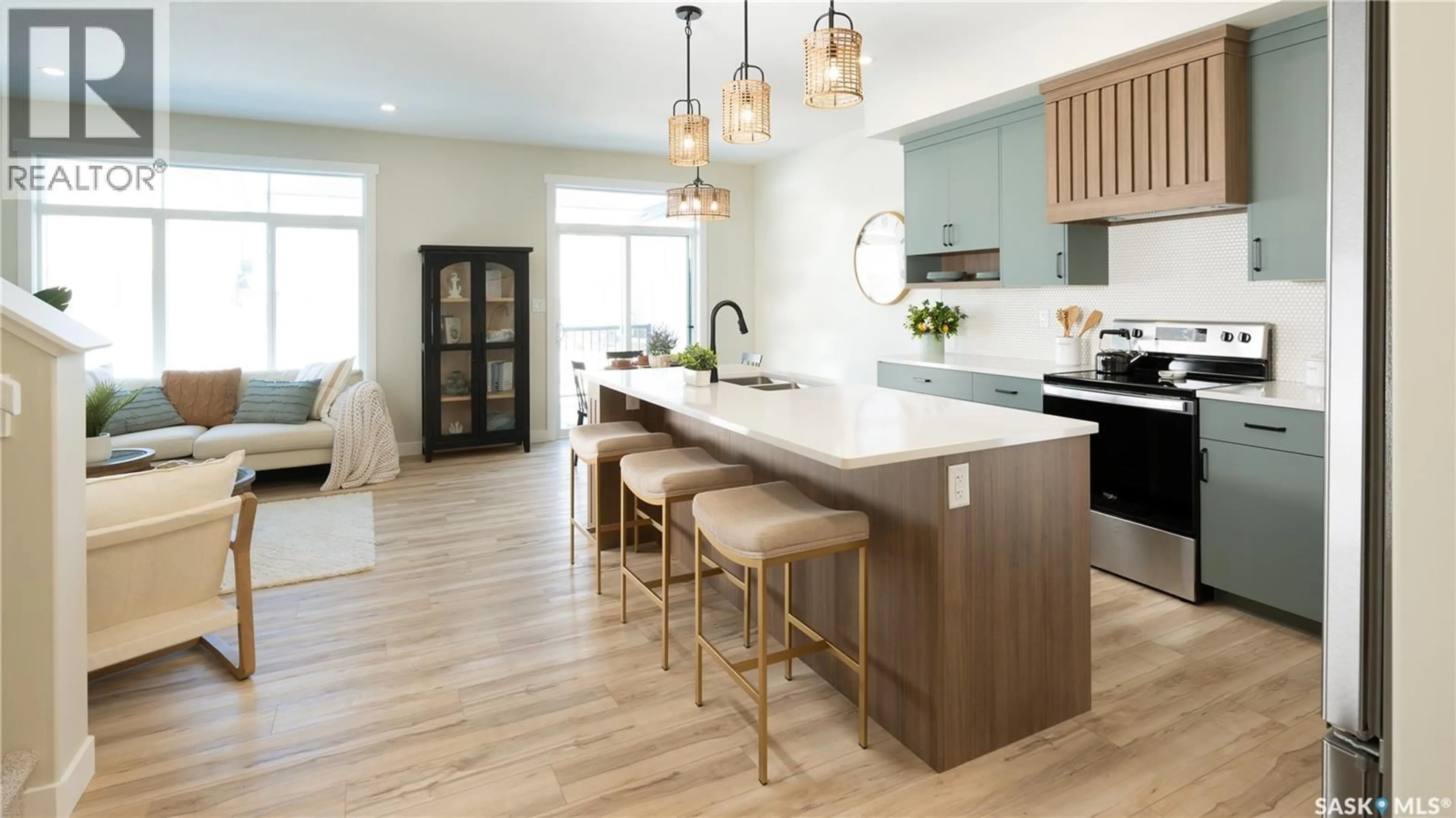 Open concept kitchen, wood/laminate floor for 202 YUEL LANE, Saskatoon Saskatchewan S7W1N7