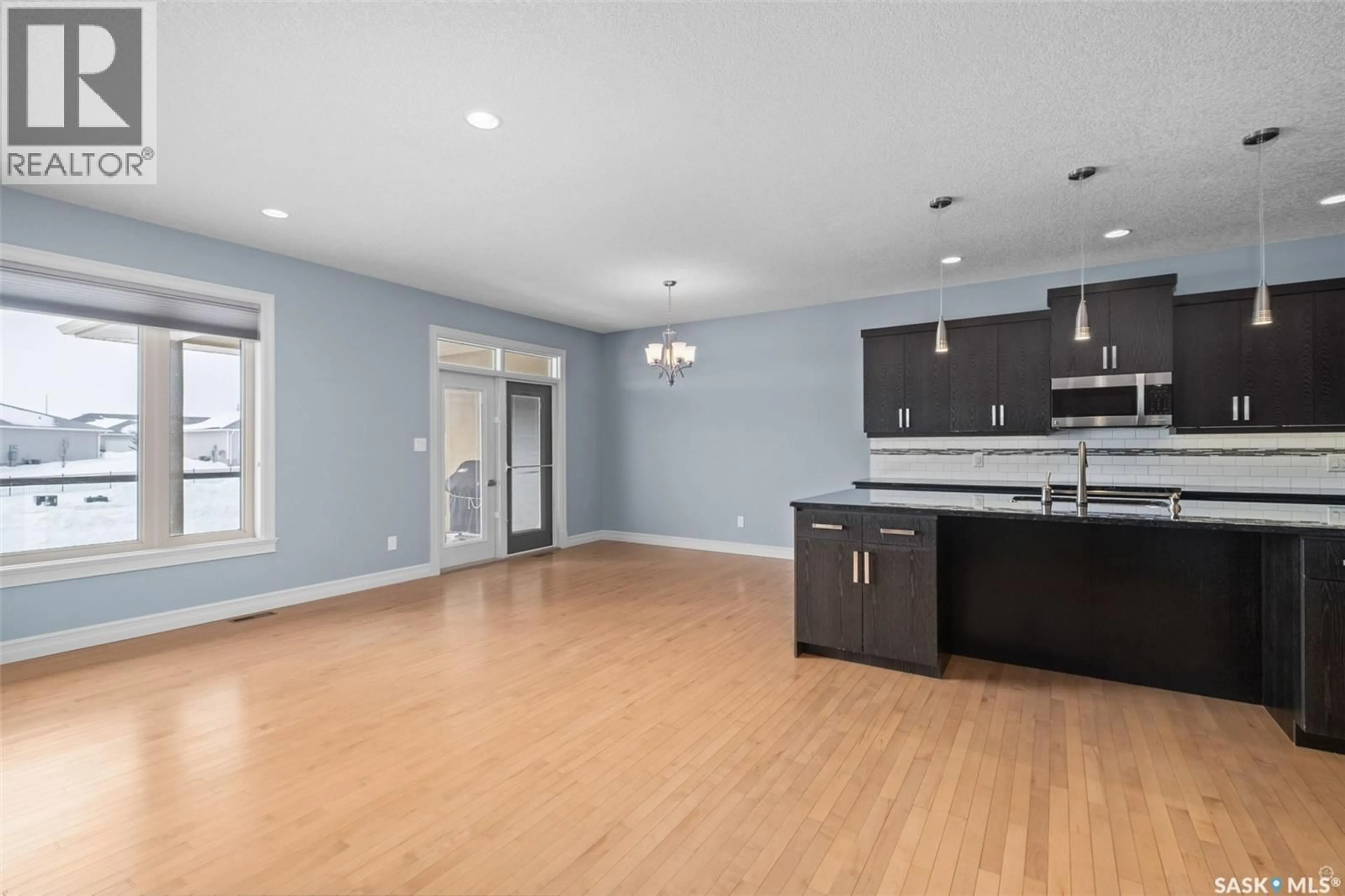 Open concept kitchen, wood/laminate floor for 6 - 2805 LAKEVIEW DRIVE, Prince Albert Saskatchewan S6W0A4