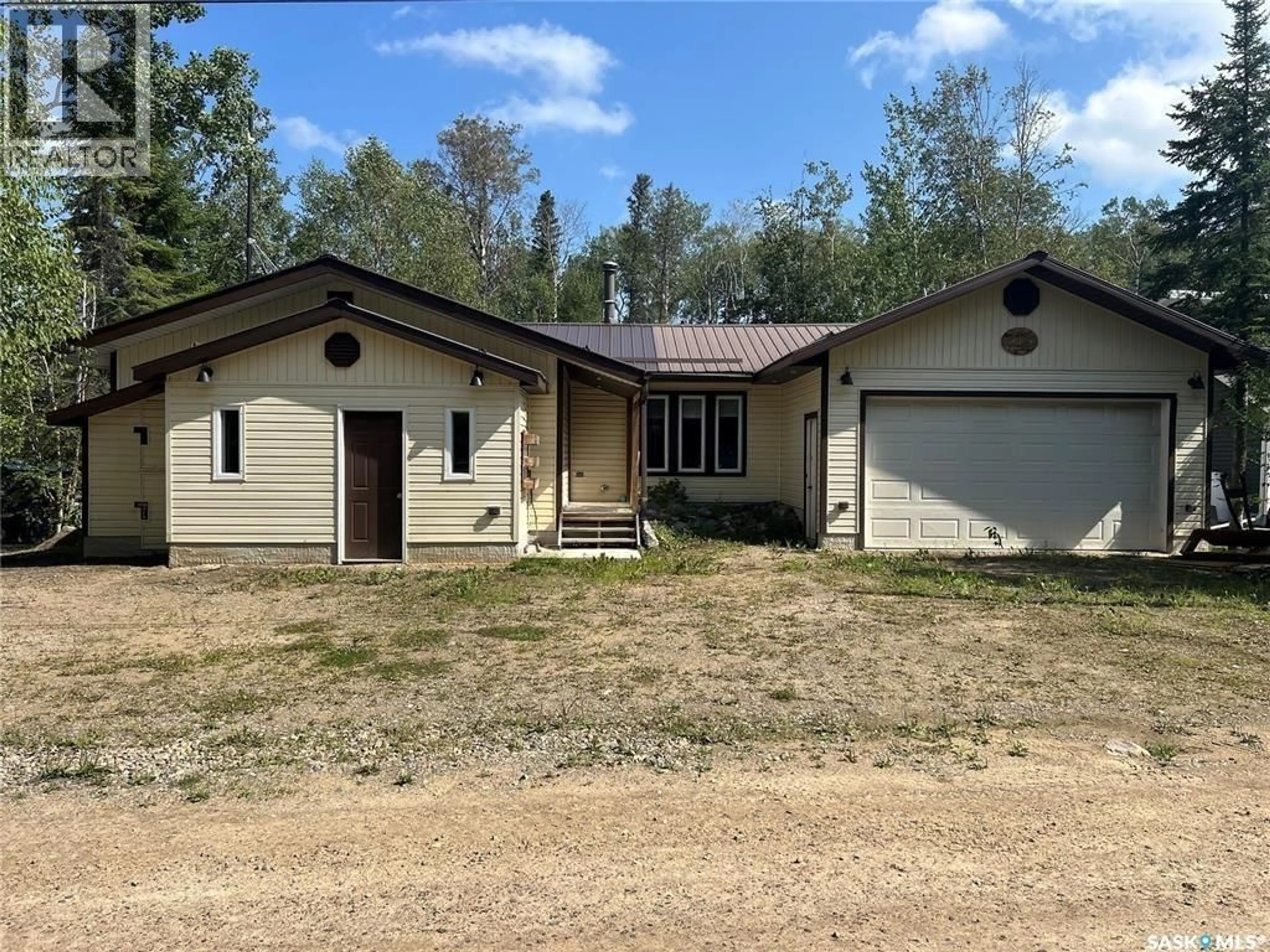 A pic from outside/outdoor area/front of a property/back of a property/a pic from drone, building for 513 TAMARACK PLACE, Northern Admin District Saskatchewan S0J2J0