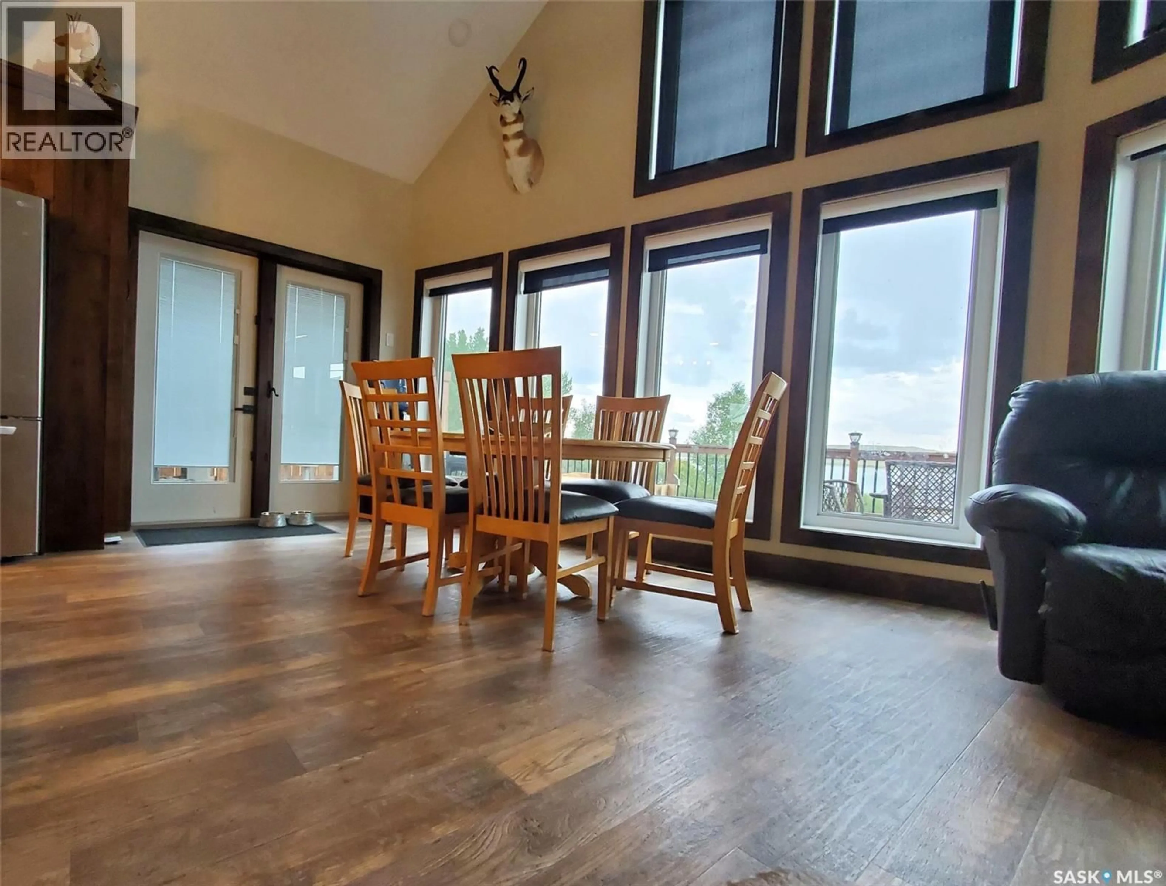 Dining room, wood/laminate floor for 101 PEBBLE DRIVE, Webb Rm No. 138 Saskatchewan S0N2X0