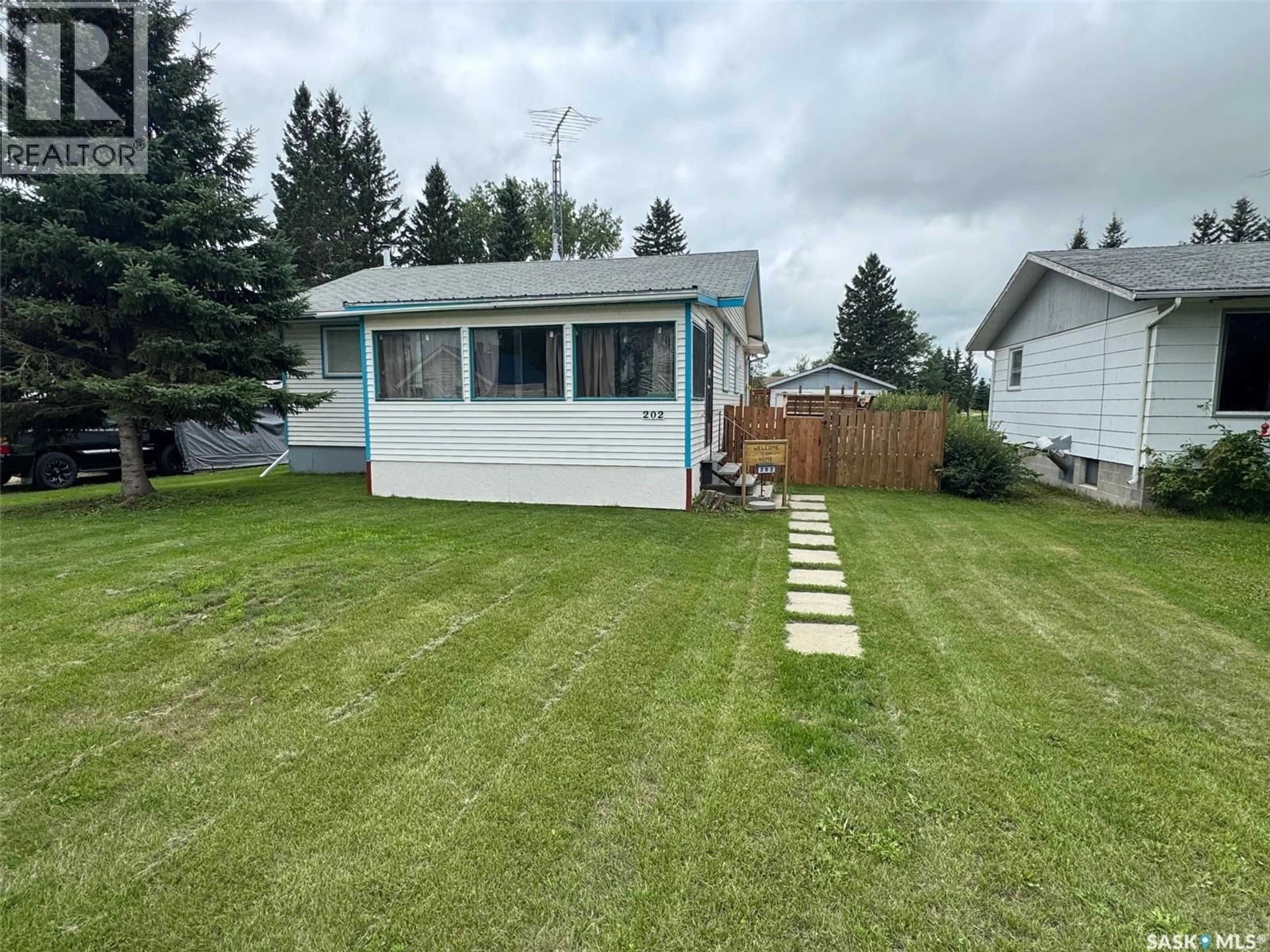A pic from outside/outdoor area/front of a property/back of a property/a pic from drone, street for 202 2ND AVENUE, Spalding Saskatchewan S0K4C0