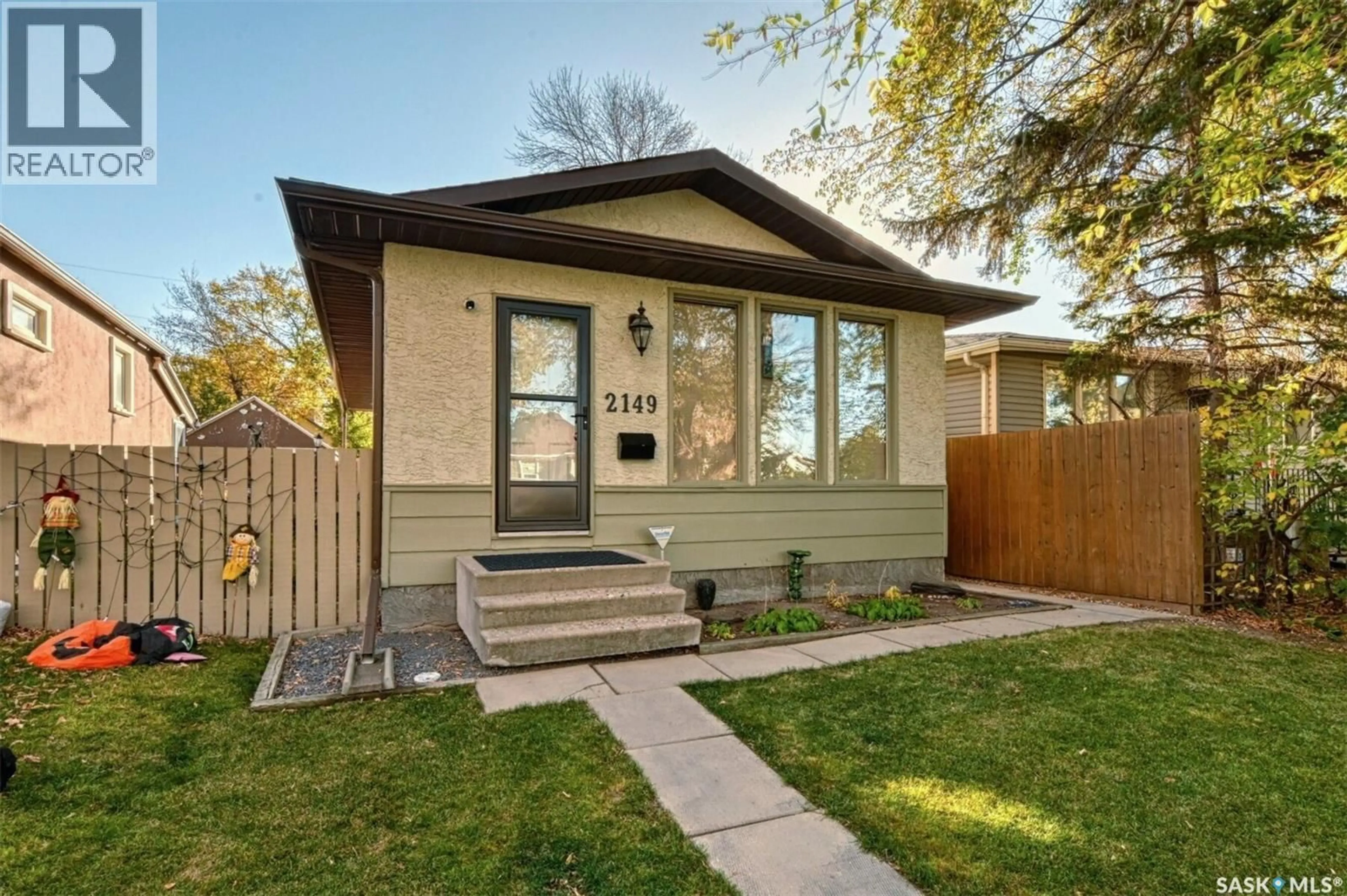 Home with brick exterior material, street for 2149 PASQUA STREET, Regina Saskatchewan S4T4M3