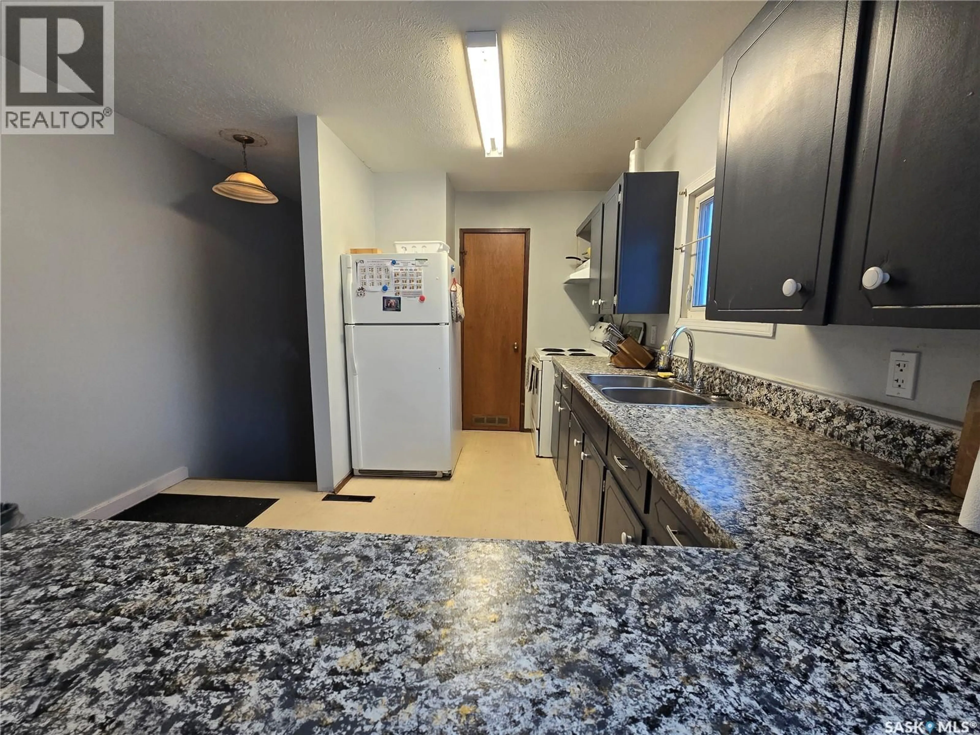 Standard kitchen, ceramic/tile floor for 223 MERGENS STREET, Weyburn Saskatchewan S4H1R4