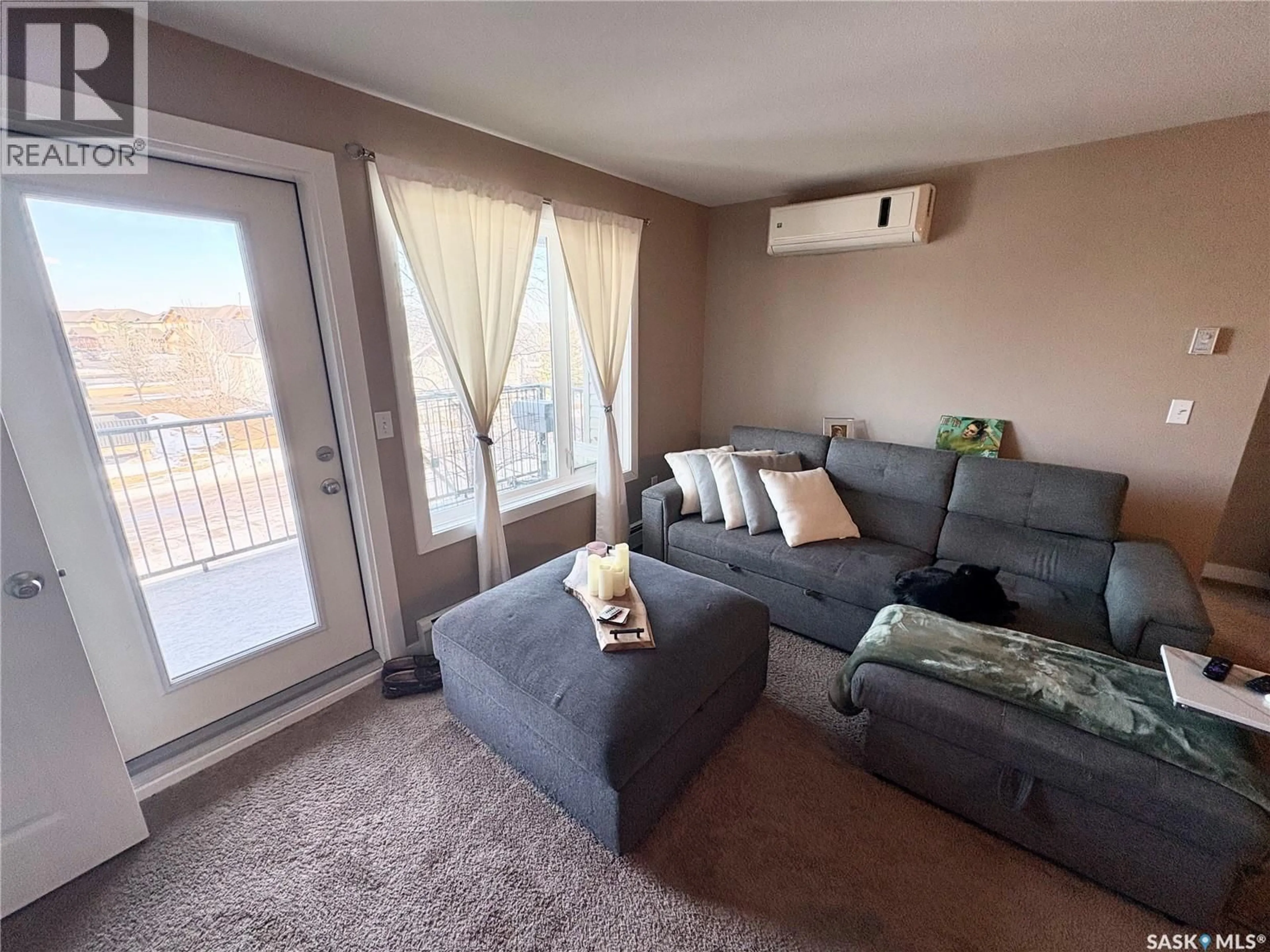 Living room with furniture, unknown for 203 - 820 5TH STREET, Weyburn Saskatchewan S4H2V2