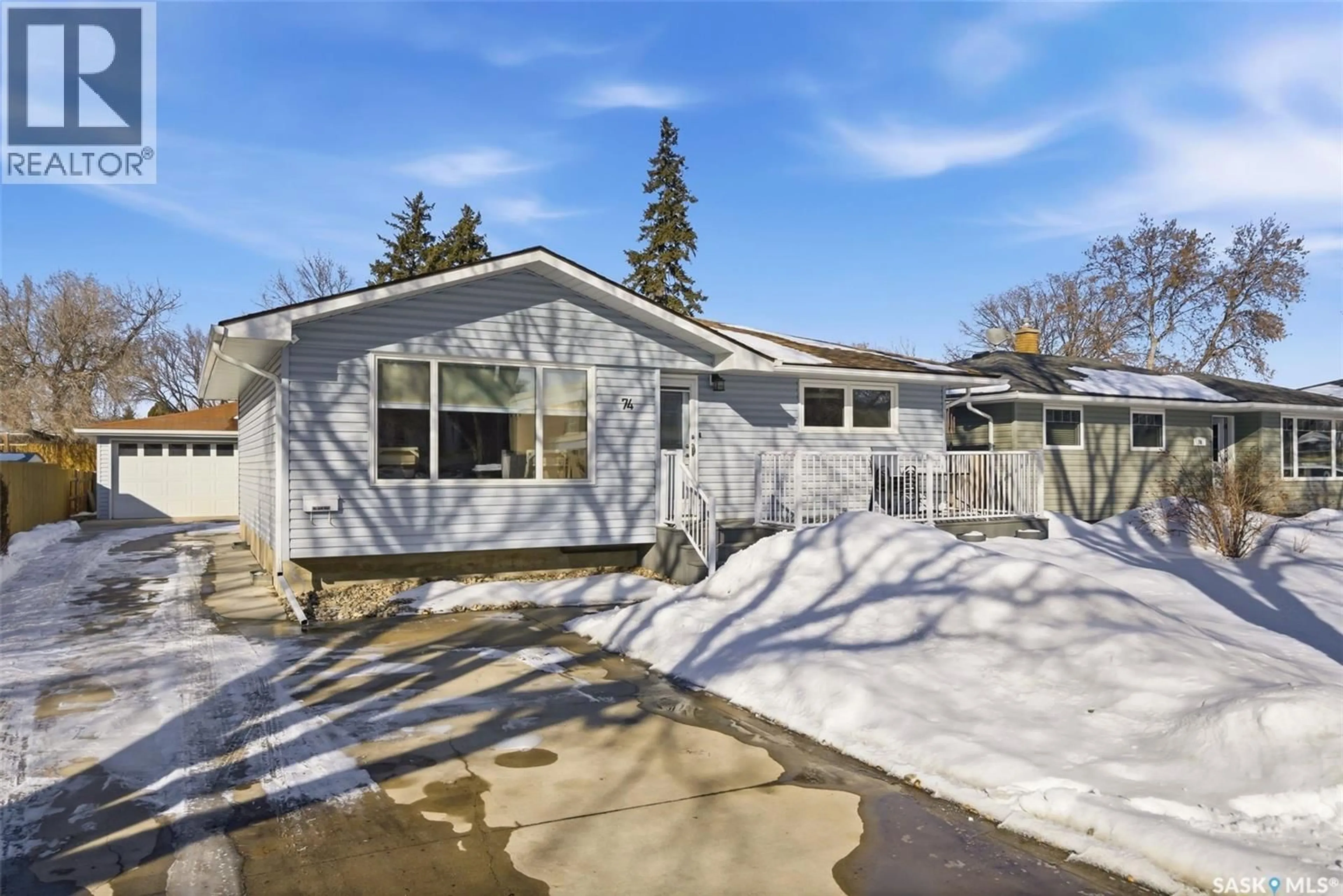 Home with vinyl exterior material, street for 74 MCMURCHY AVENUE, Regina Saskatchewan S4R3G4