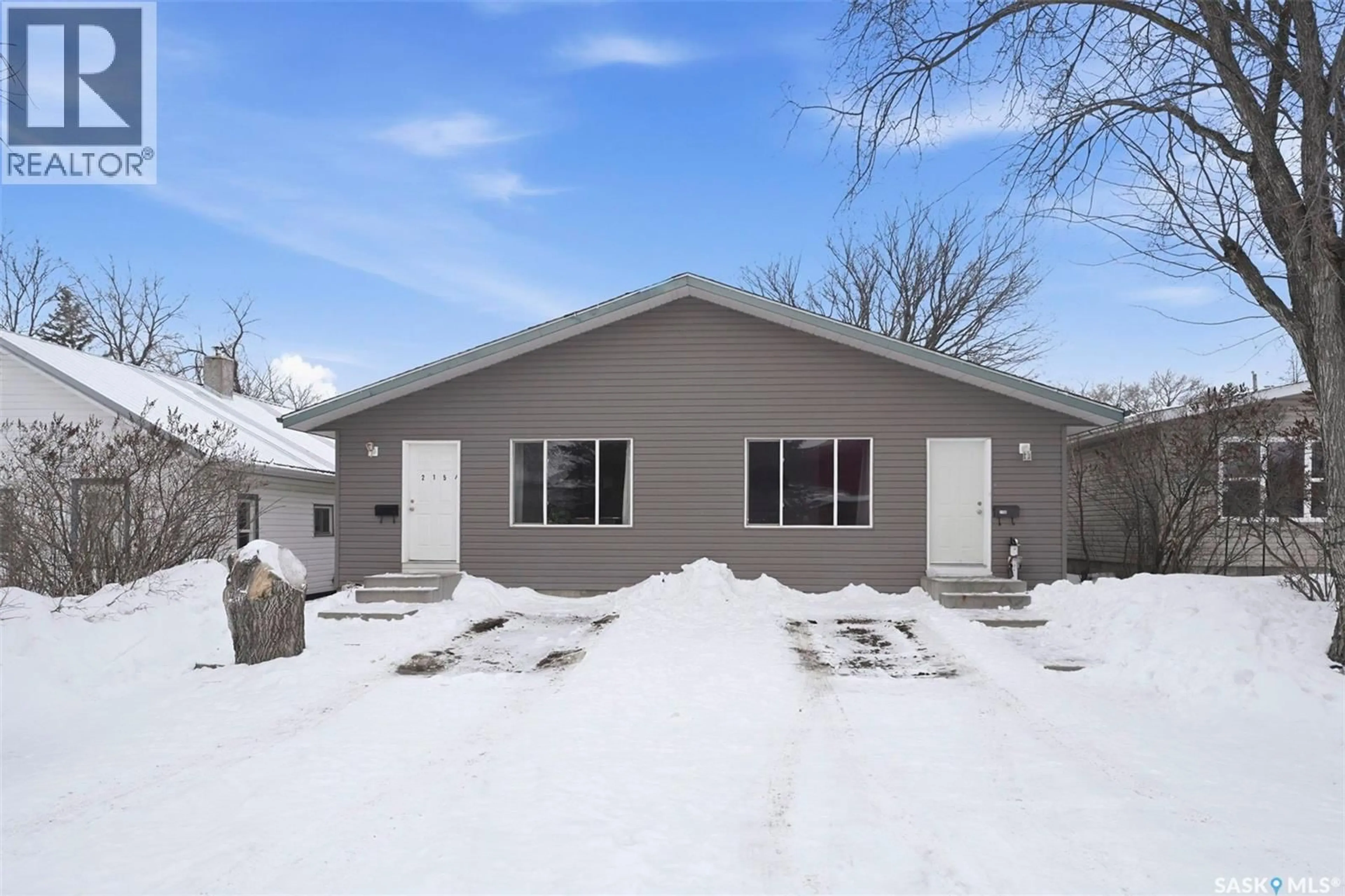 Home with vinyl exterior material, street for 215A - 215B 3RD STREET, Dalmeny Saskatchewan S0K1A0