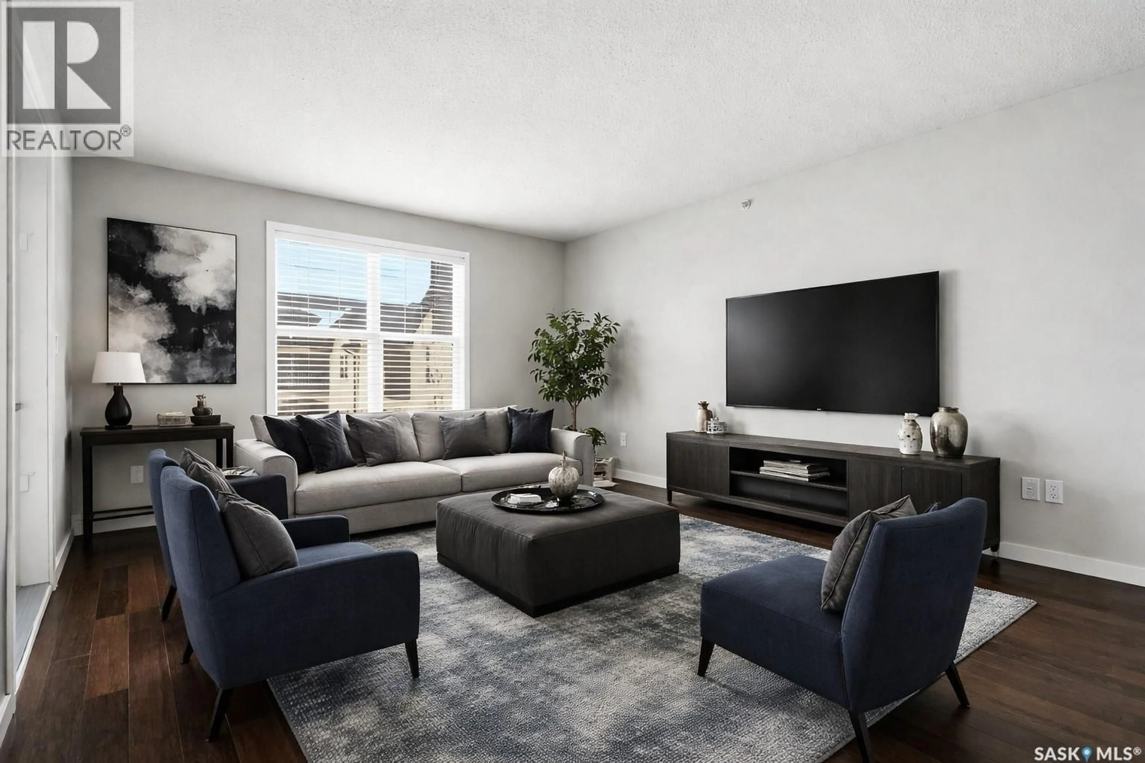 Living room with furniture, unknown for 317 1640 DAKOTA DRIVE, Regina Saskatchewan S4Z0A4