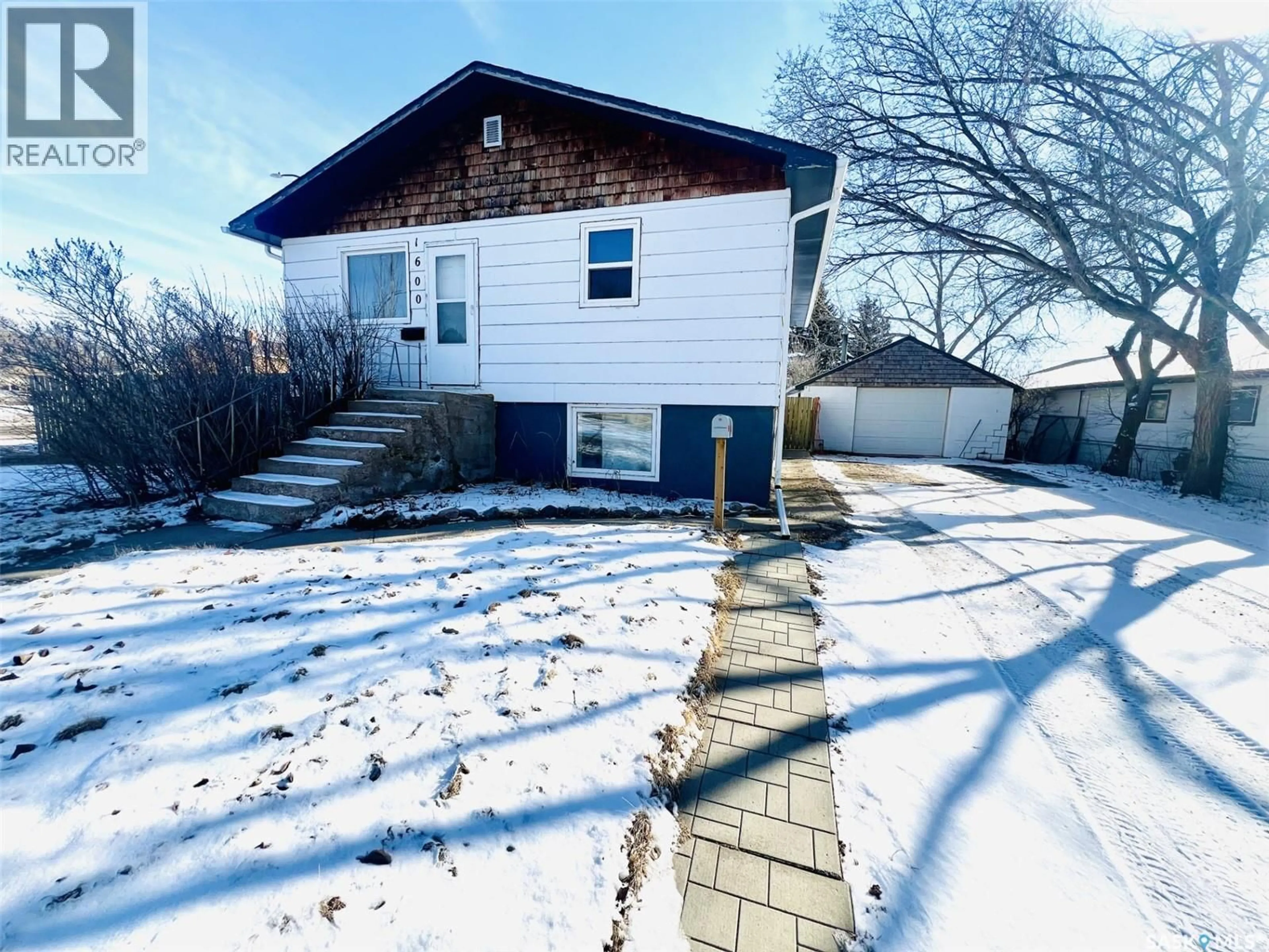 A pic from outside/outdoor area/front of a property/back of a property/a pic from drone, street for 1600 CHAPLIN STREET, Swift Current Saskatchewan S9H1K8