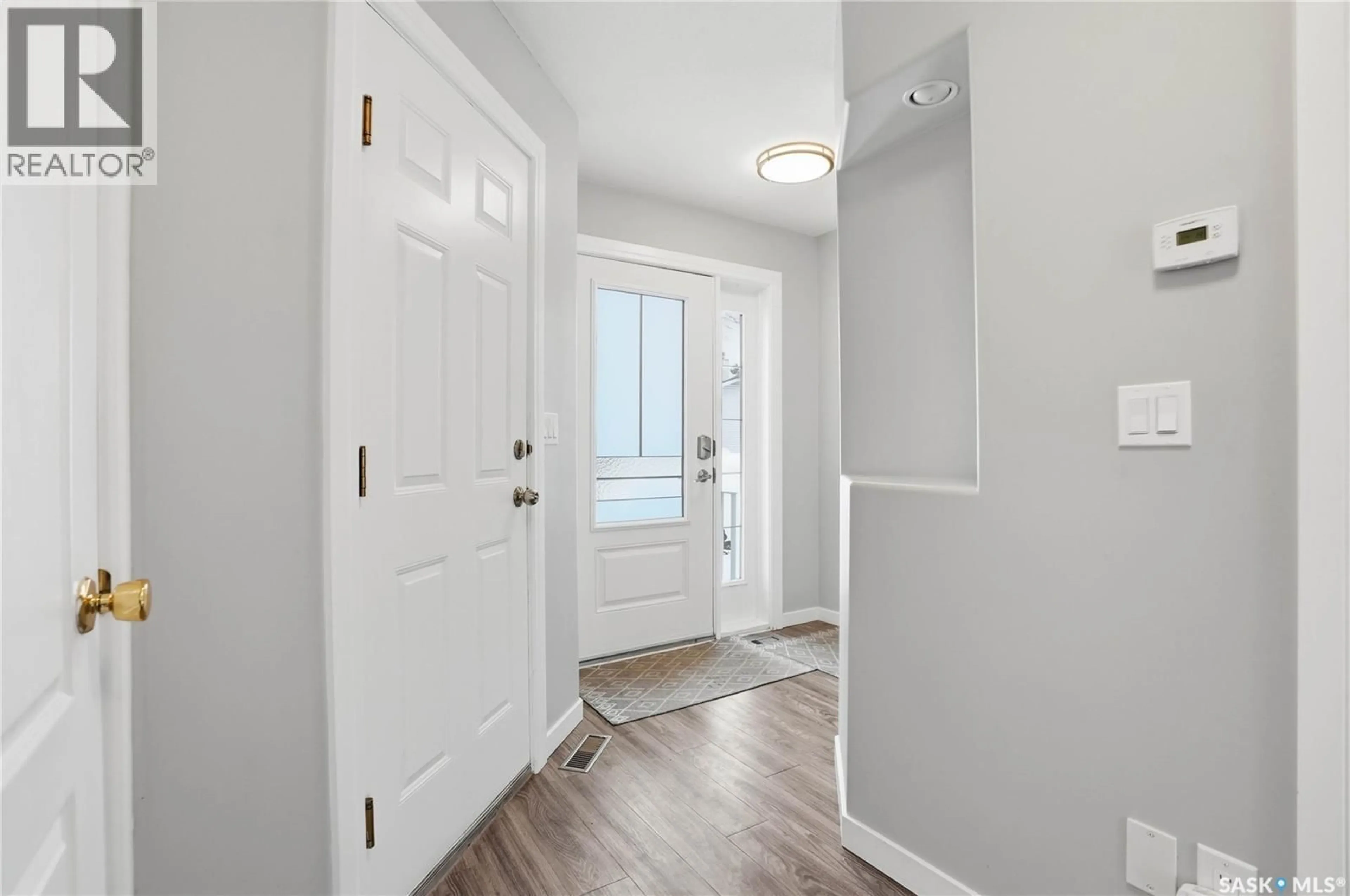 Indoor entryway for 16 605 PEREHUDOFF CRESCENT, Saskatoon Saskatchewan S7N4N7