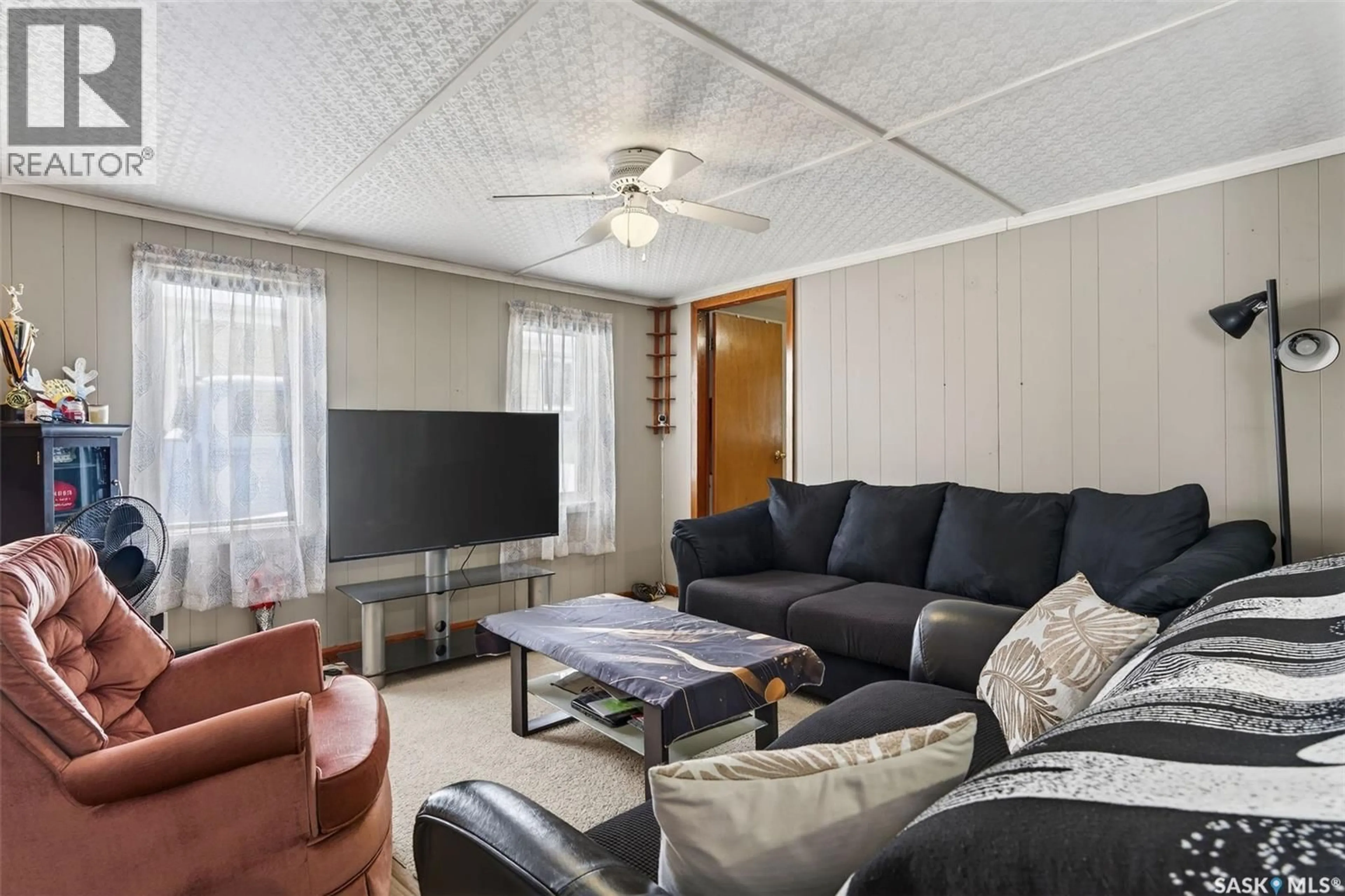 Living room with furniture, unknown for 313 BURNS AVE, Melfort Saskatchewan S0E1A0