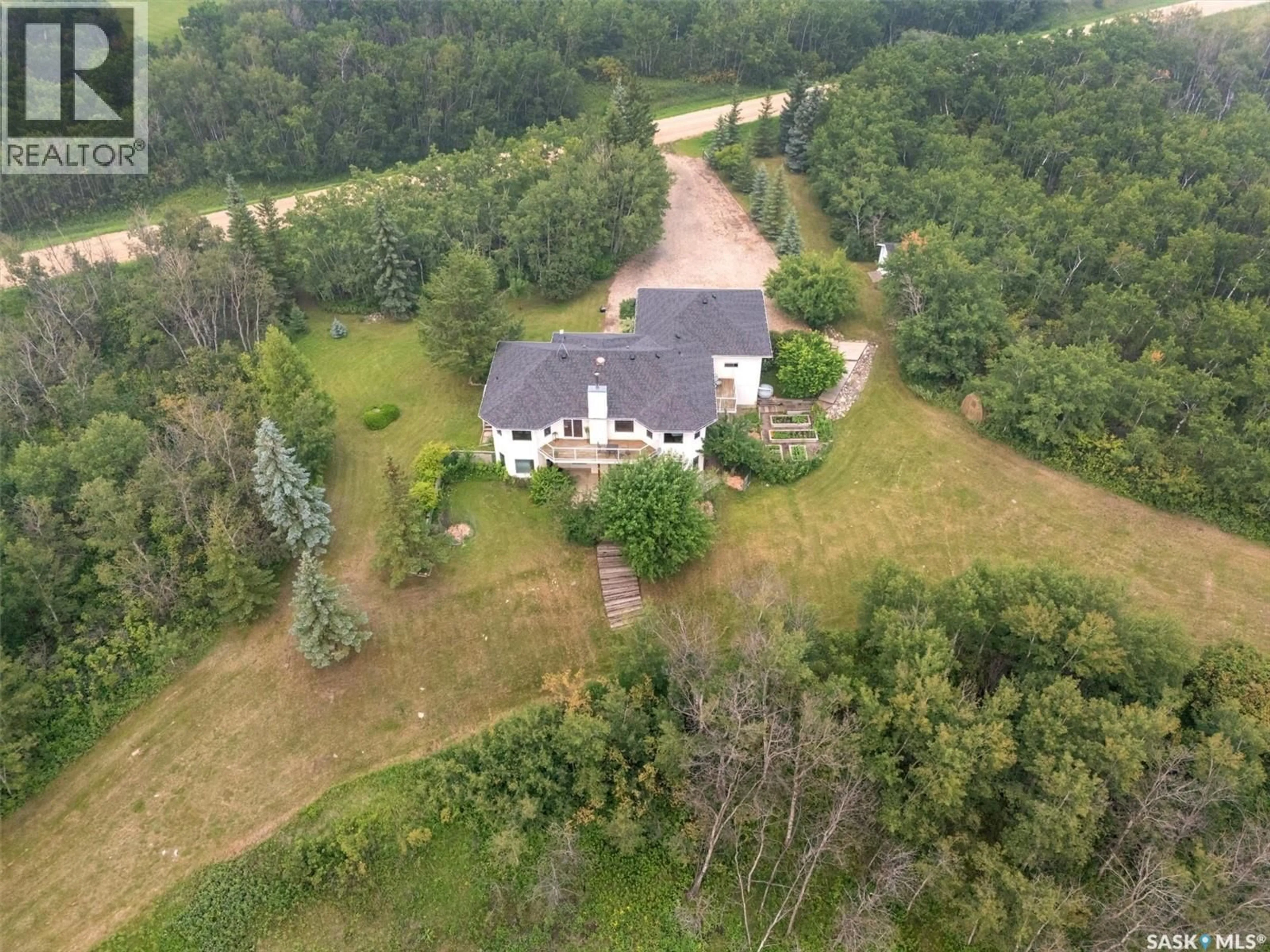 A pic from outside/outdoor area/front of a property/back of a property/a pic from drone, unknown for 103 WILLOW ROAD, Aberdeen Rm No. 373 Saskatchewan S0K0A0