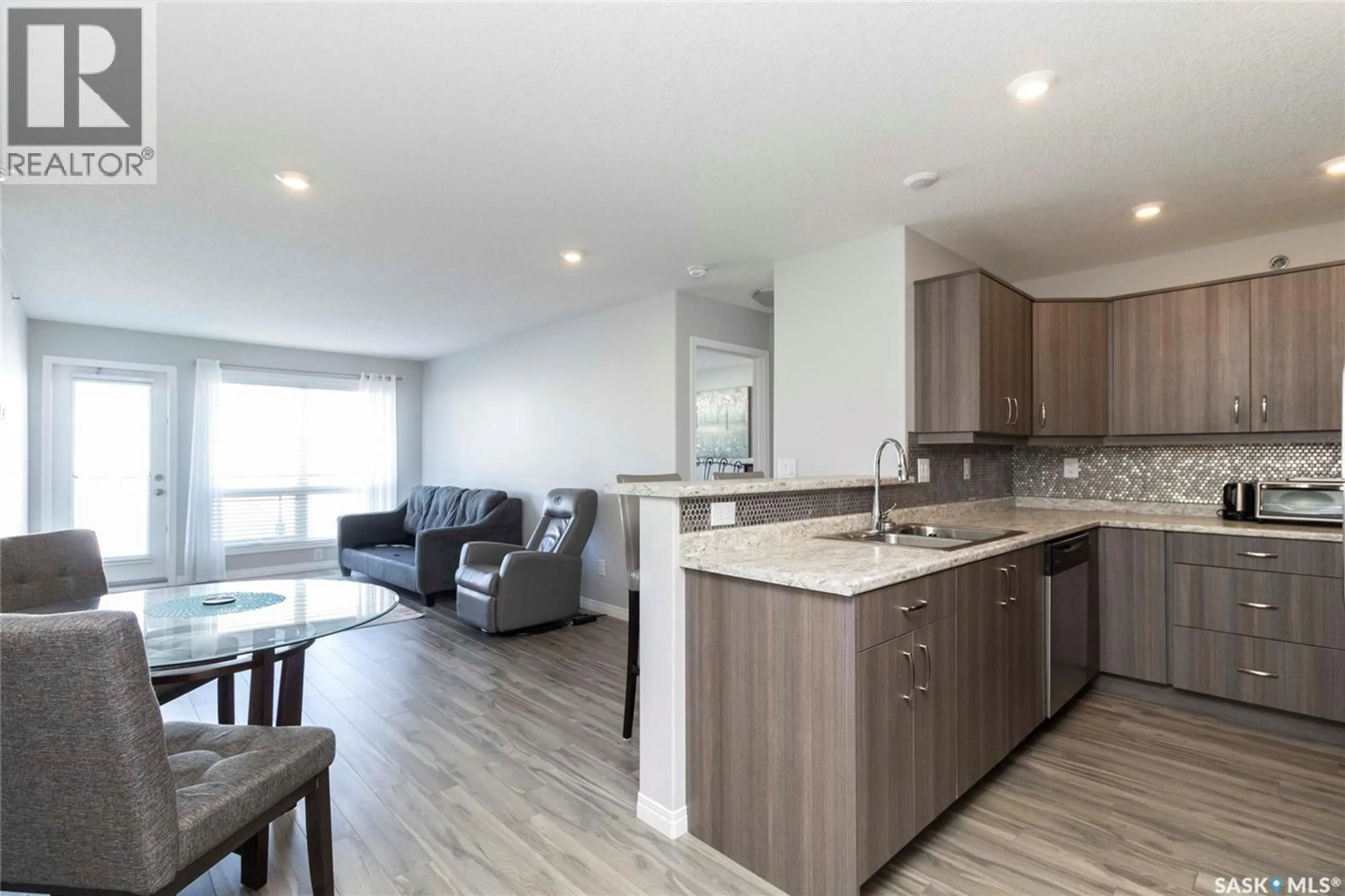 Open concept kitchen, unknown for 4311 108 WILLIS CRESCENT, Saskatoon Saskatchewan S7T0W8
