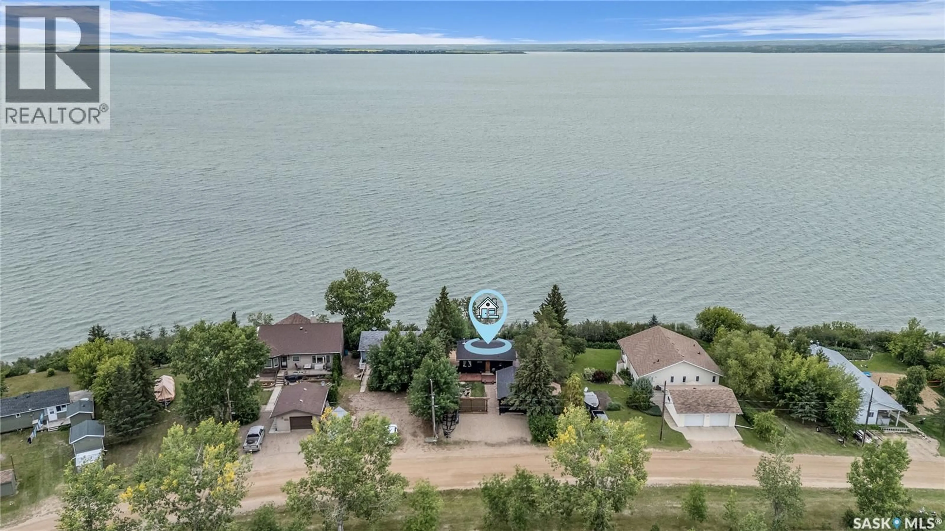 A pic from outside/outdoor area/front of a property/back of a property/a pic from drone, water/lake/river/ocean view for 635 TOBEY CRESCENT, Meota Rm No.468 Saskatchewan S0M1X0
