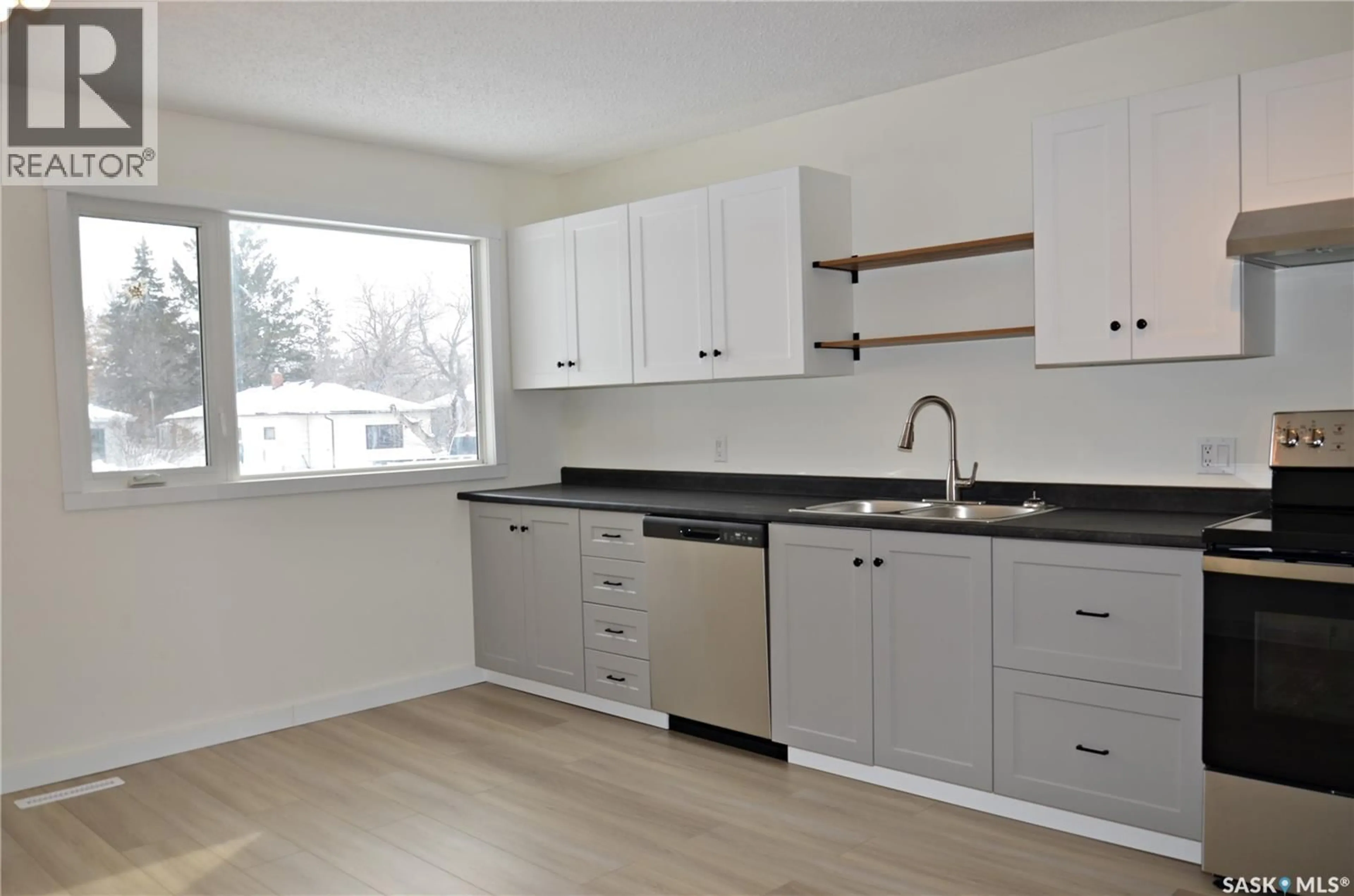 Standard kitchen, wood/laminate floor for 209 TORRAN STREET, Colonsay Saskatchewan S0K0Z6