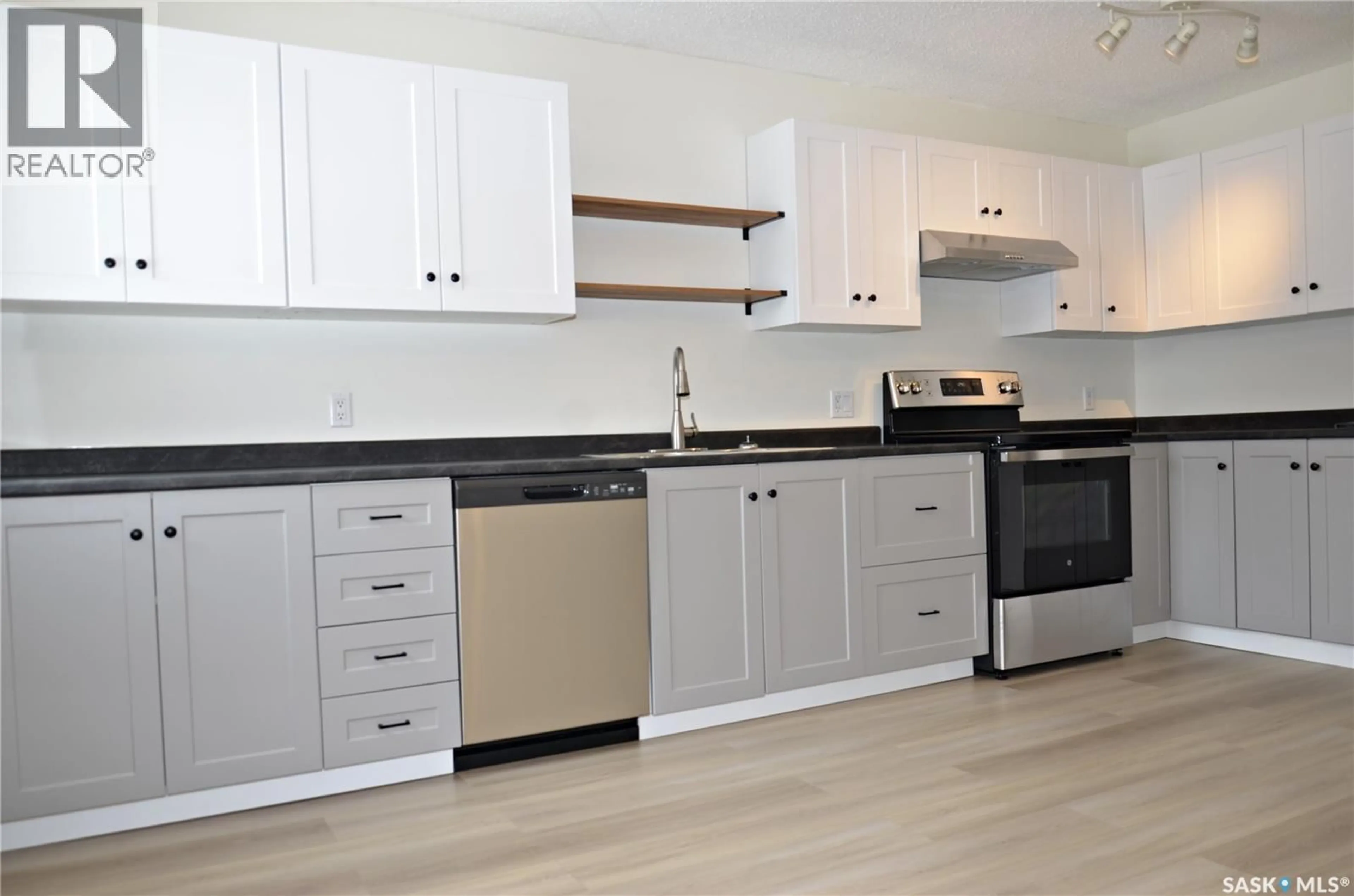Standard kitchen, wood/laminate floor for 209 TORRAN STREET, Colonsay Saskatchewan S0K0Z6