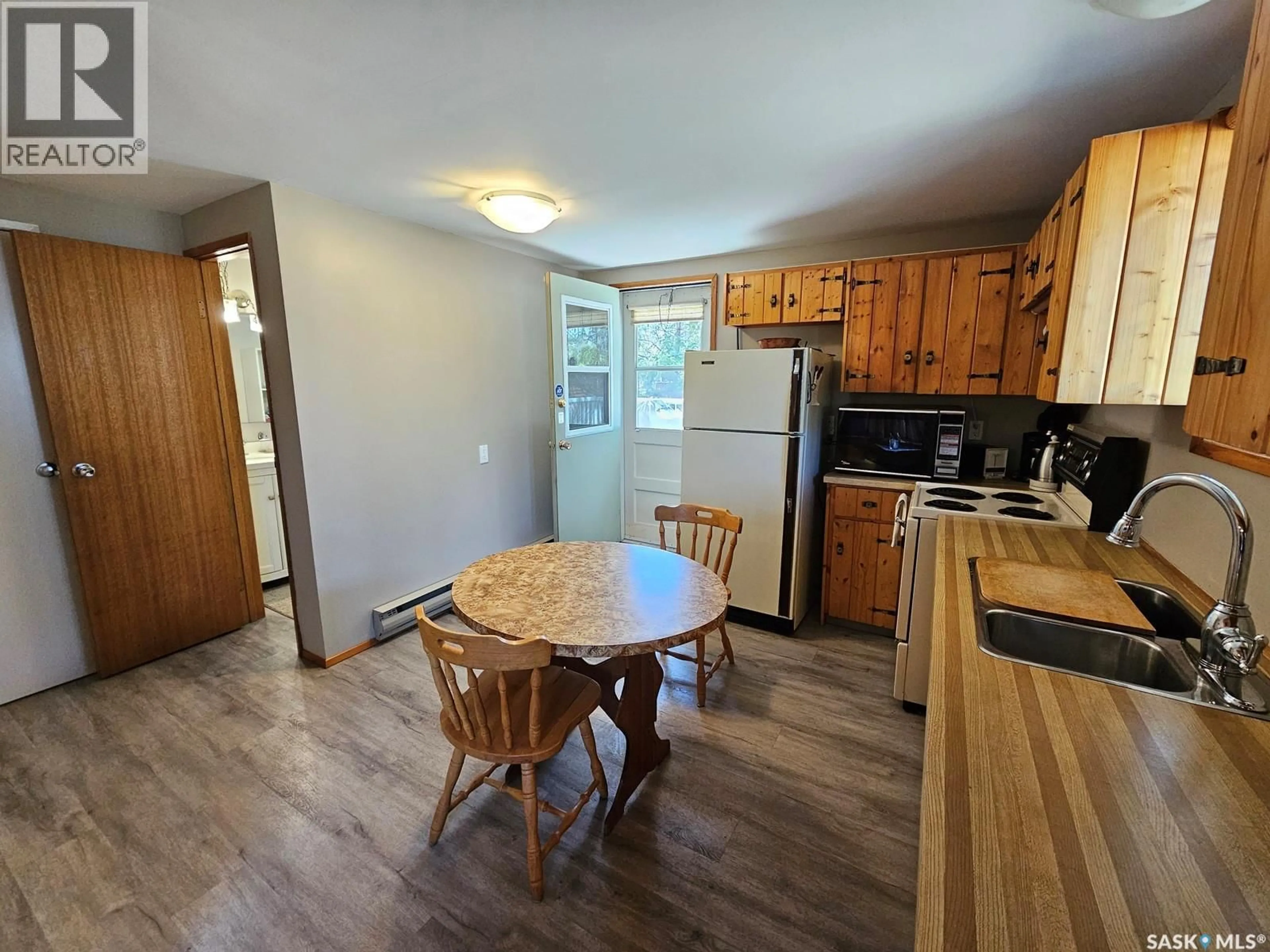 Standard kitchen, wood/laminate floor for 303 CHRISTEL CRESCENT, Beaver River Rm No. 622 Saskatchewan S0M1A0