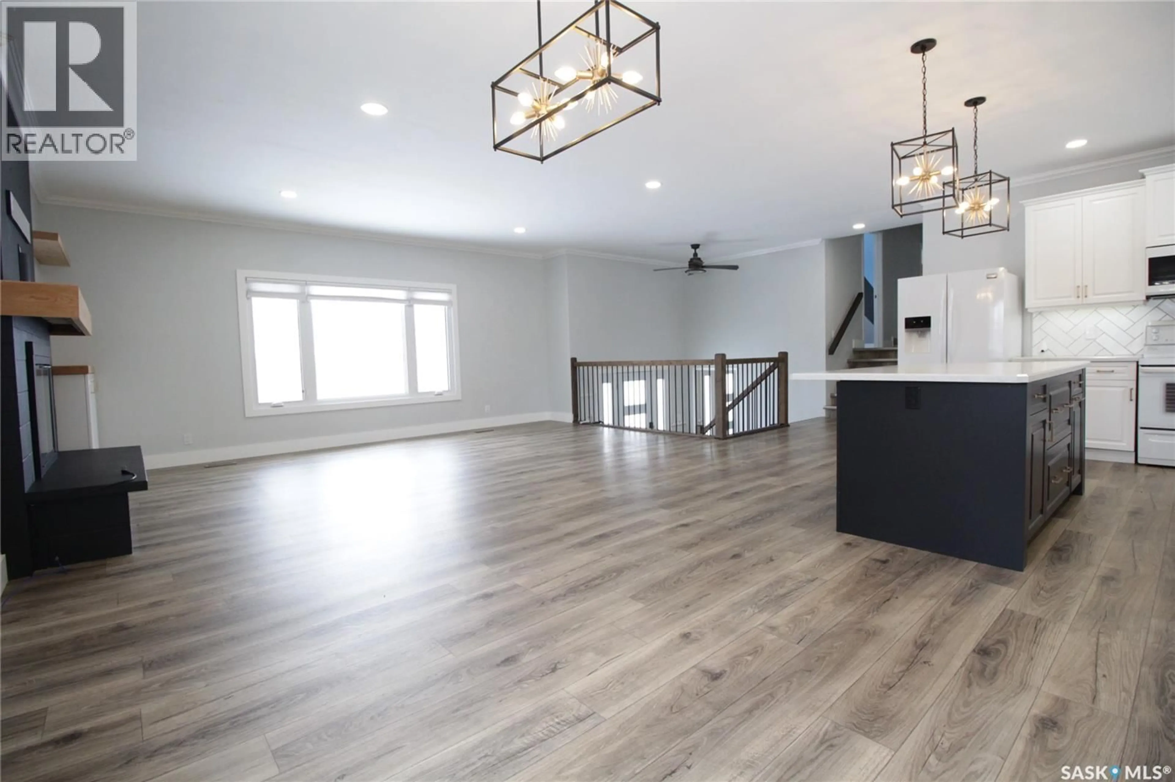 Open concept kitchen, wood/laminate floor for 5 SOURIS AVENUE, Redvers Saskatchewan S0C2H0