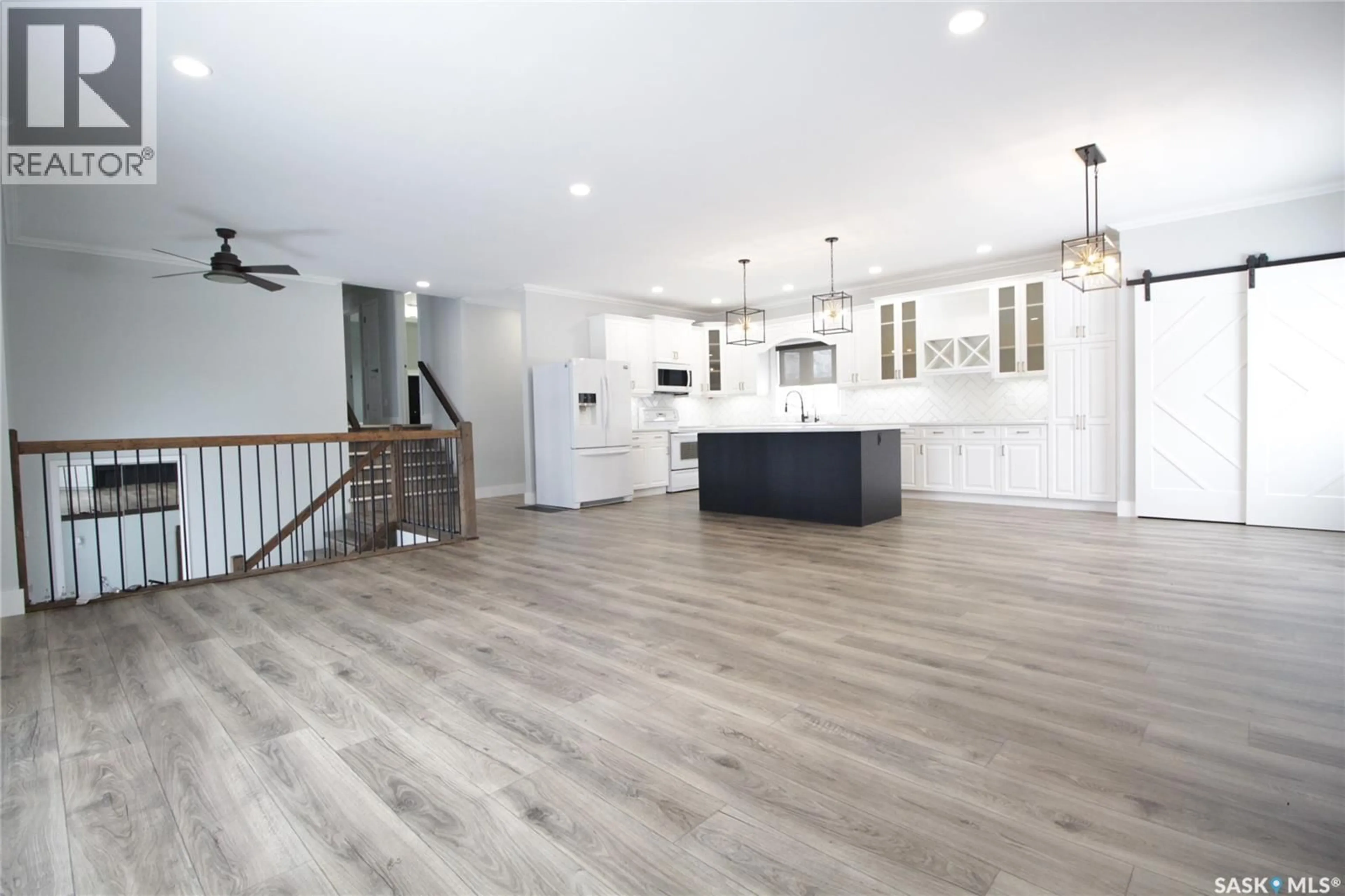 Open concept kitchen, wood/laminate floor for 5 SOURIS AVENUE, Redvers Saskatchewan S0C2H0