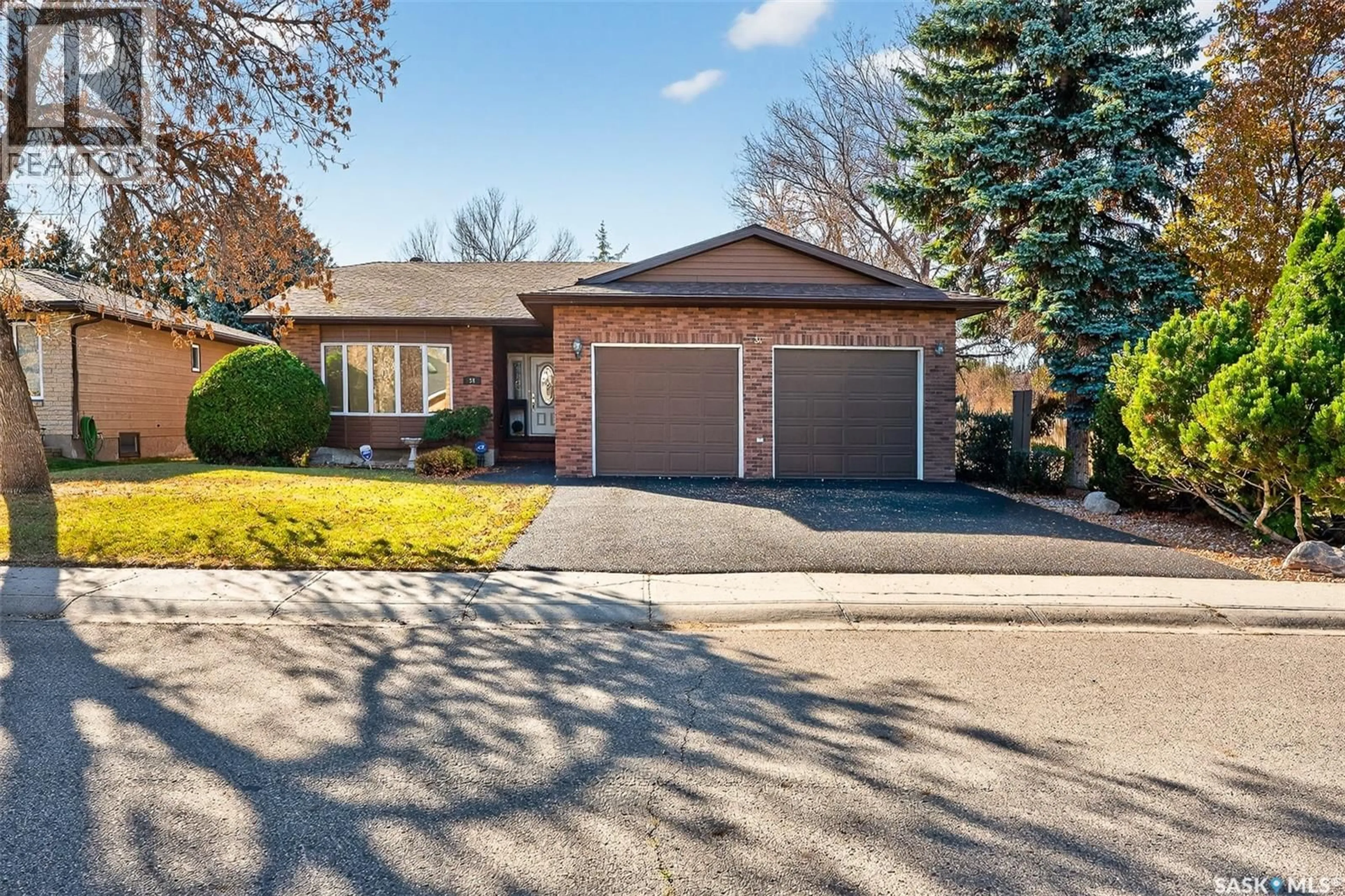 Home with brick exterior material, street for 34 ELISIA DRIVE, Moose Jaw Saskatchewan S6J1G9