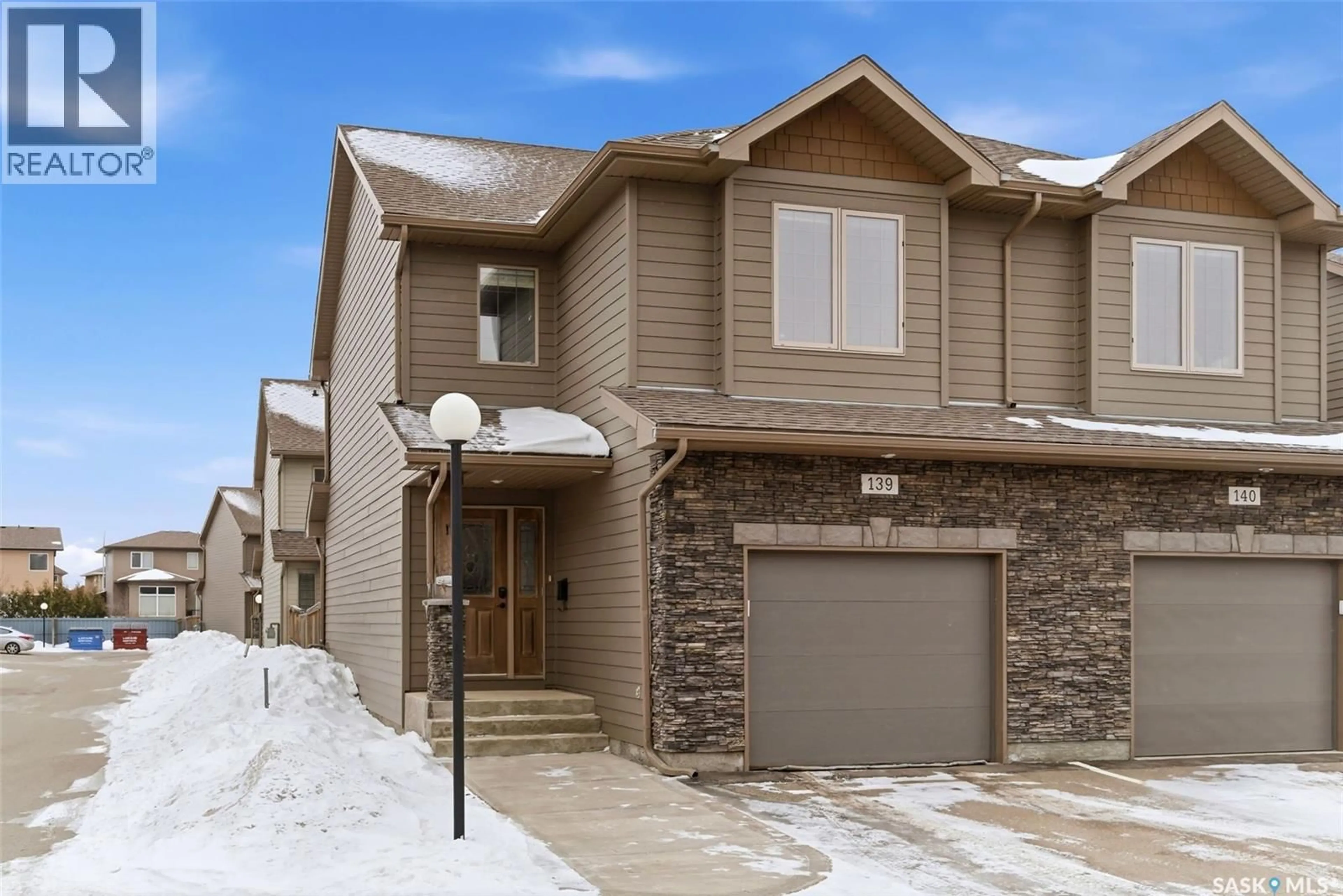 Home with brick exterior material, street for 2501 - 139 WINDSOR PARK ROAD, Regina Saskatchewan S4V1P3