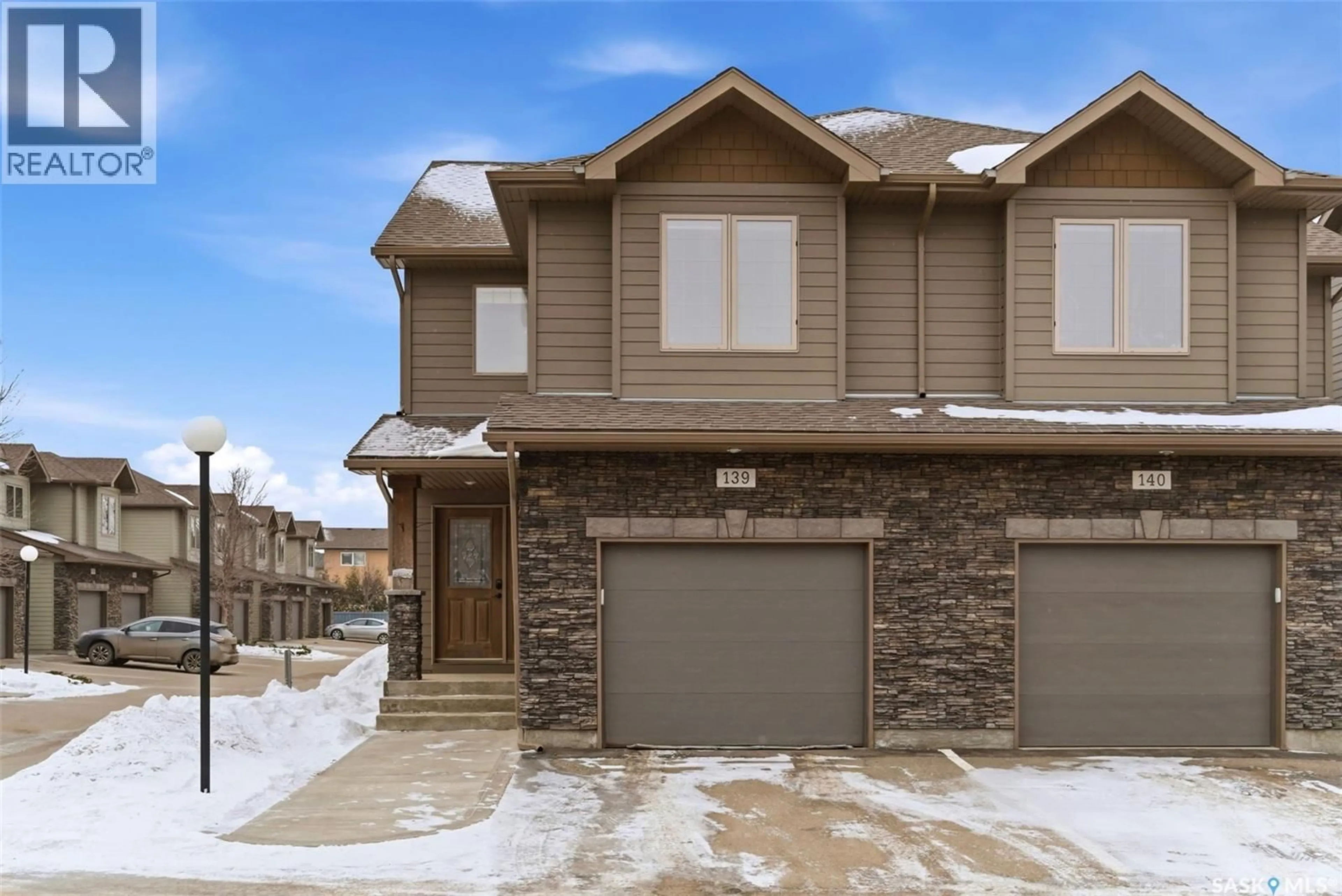 Home with brick exterior material, street for 2501 - 139 WINDSOR PARK ROAD, Regina Saskatchewan S4V1P3