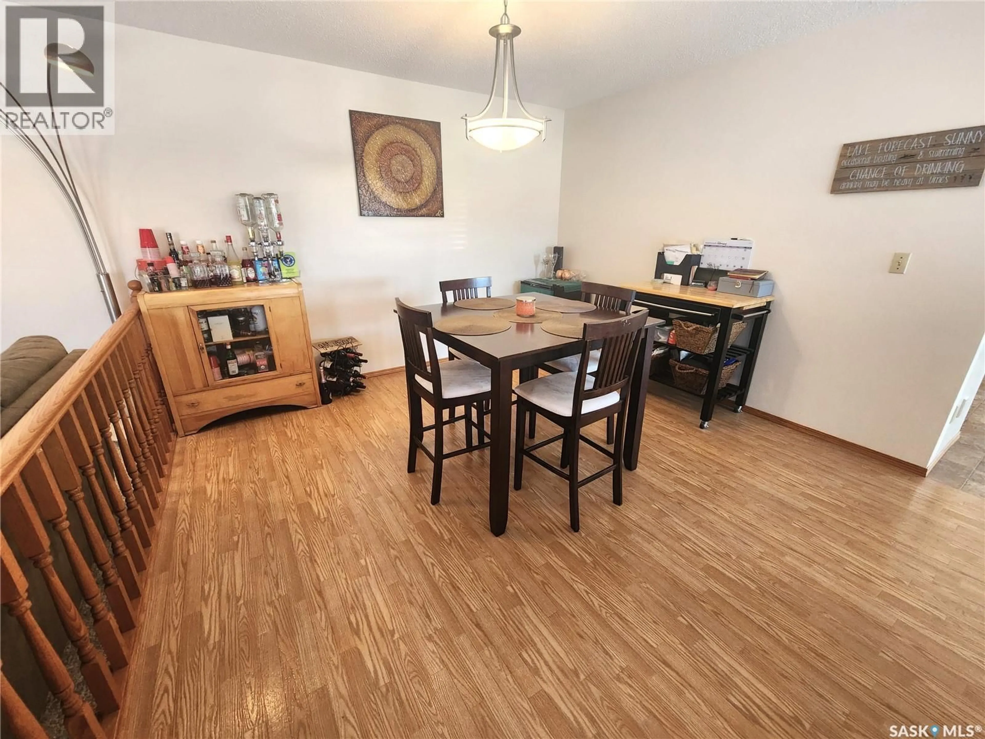 Dining room, wood/laminate floor for 115 CARSON BAY, Lampman Saskatchewan S0C1N0