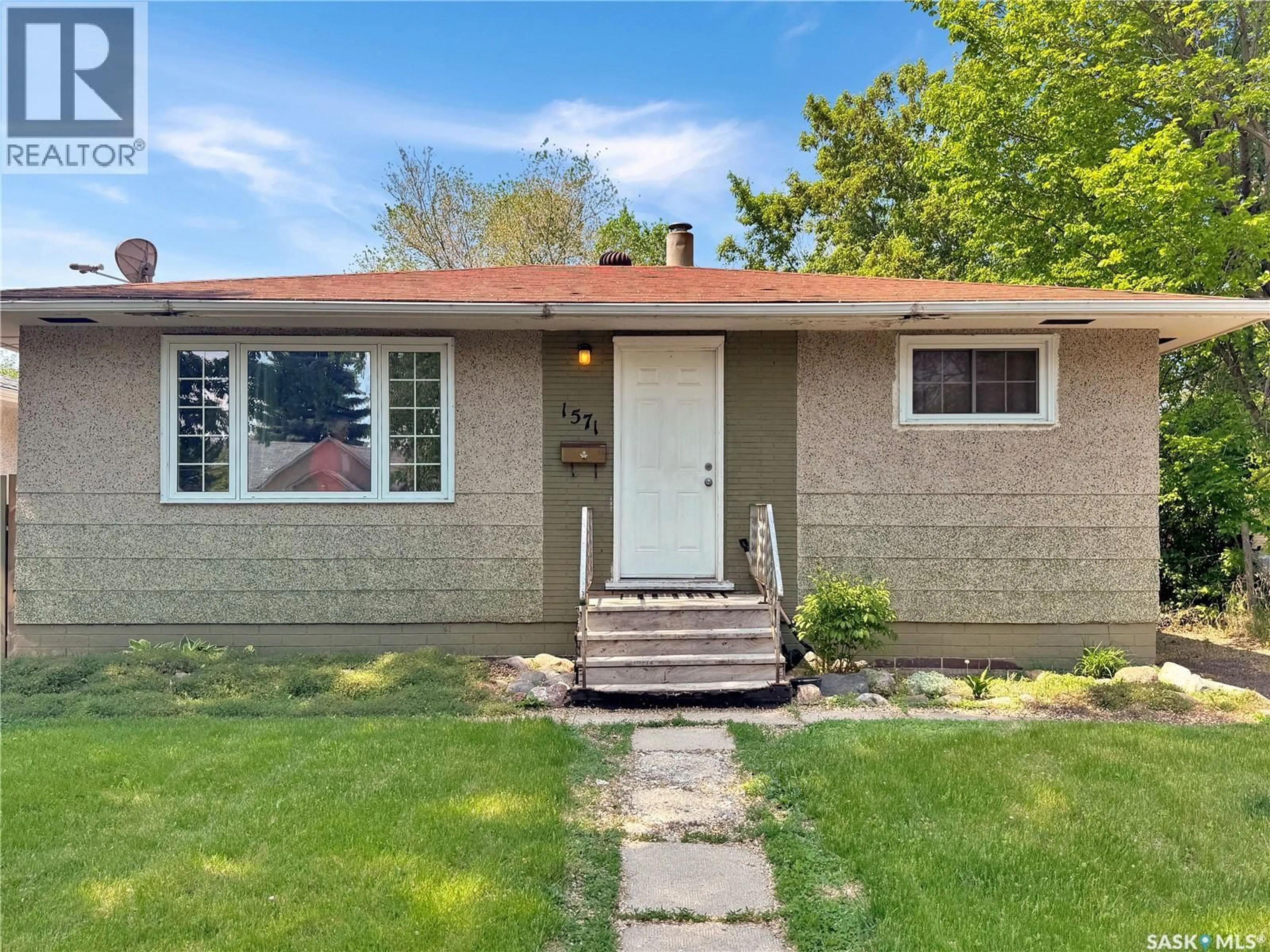 Home with brick exterior material, street for 1571 105TH STREET, North Battleford Saskatchewan S9A1T5