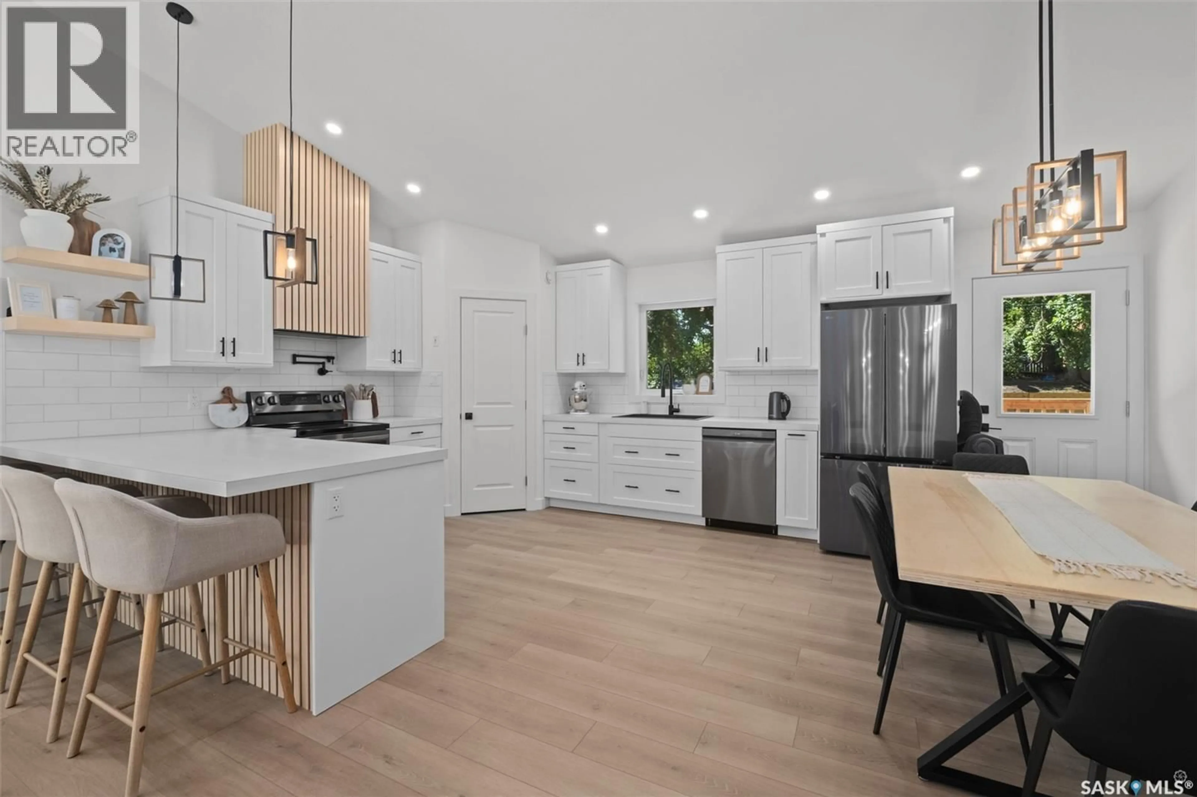 Open concept kitchen, wood/laminate floor for 41 19TH STREET, Prince Albert Saskatchewan S6V1J1