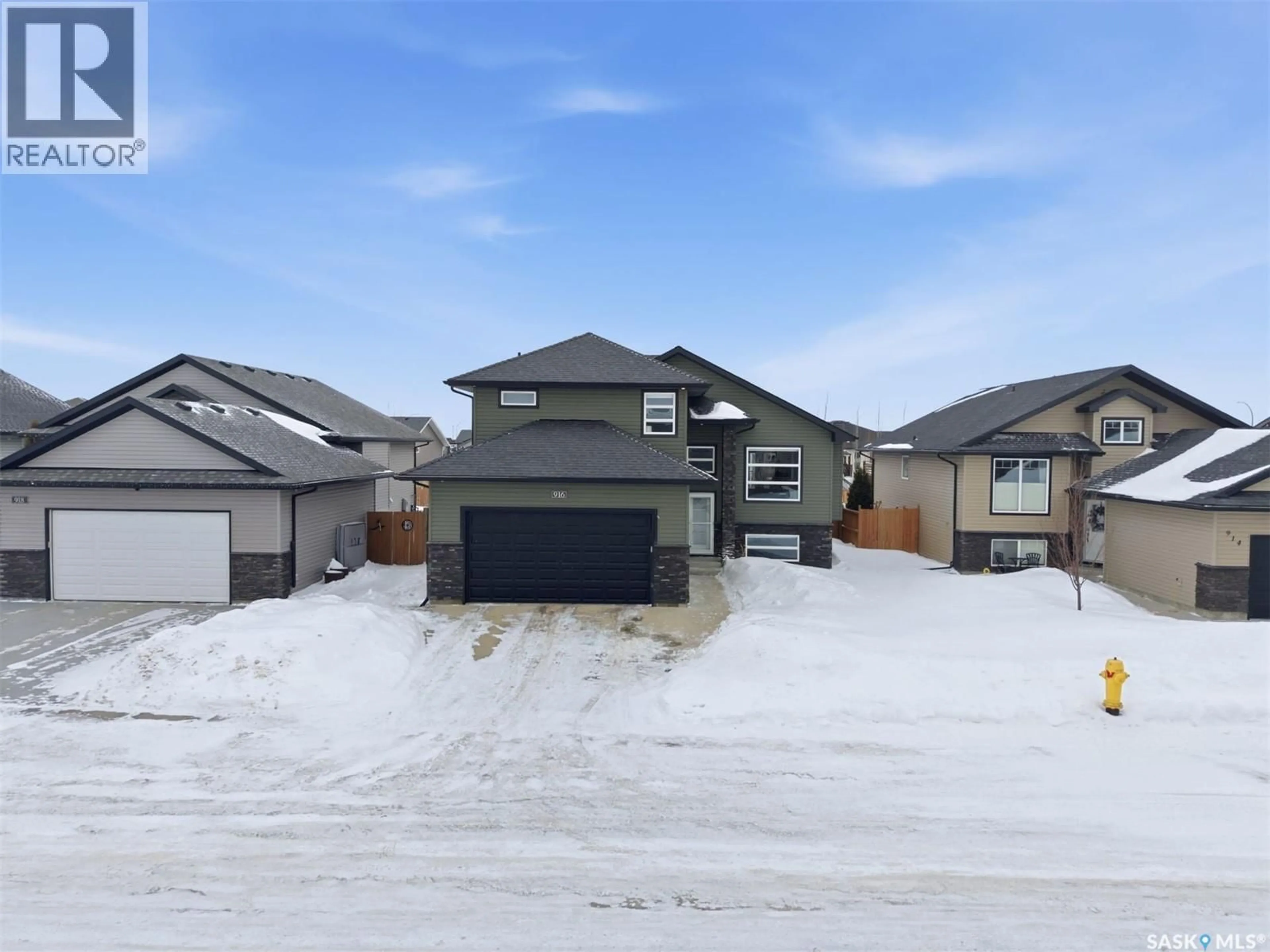 A pic from outside/outdoor area/front of a property/back of a property/a pic from drone, street for 916 STONY CRESCENT, Martensville Saskatchewan S0K2T1
