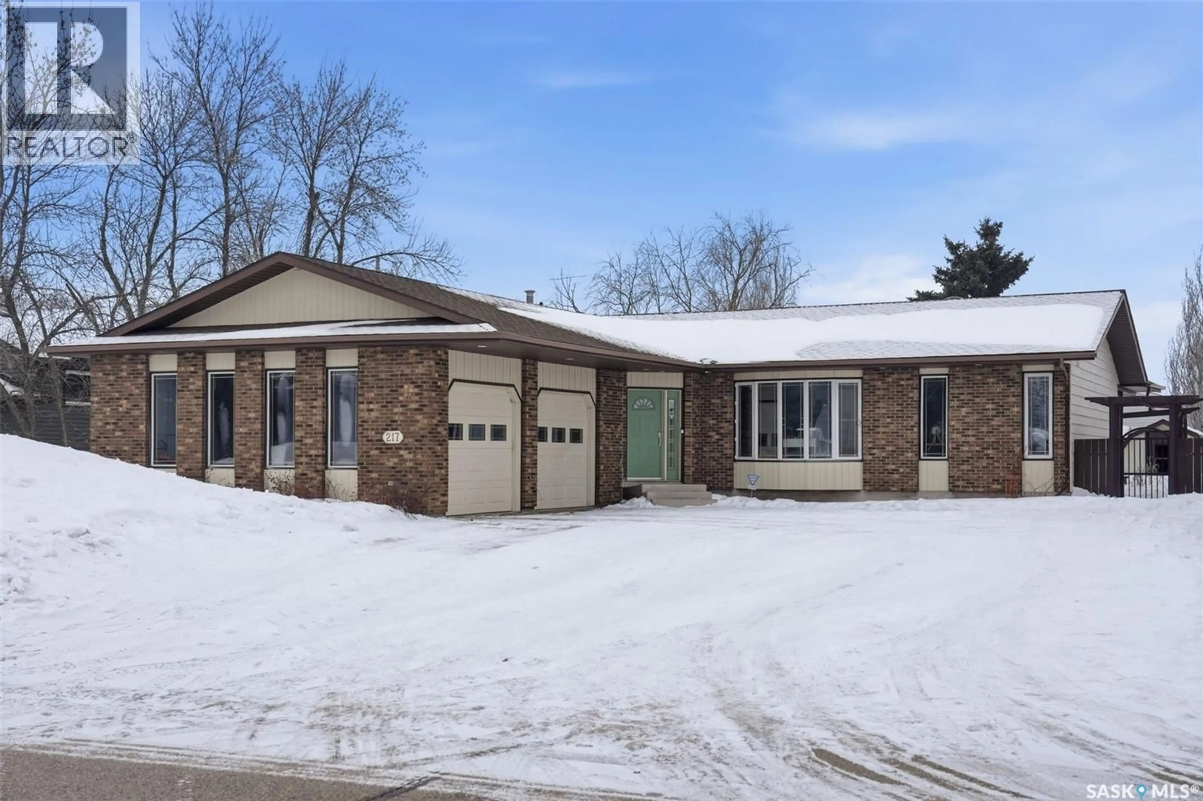Home with brick exterior material, street for 217 13TH AVENUE, Watrous Saskatchewan S0K4T0