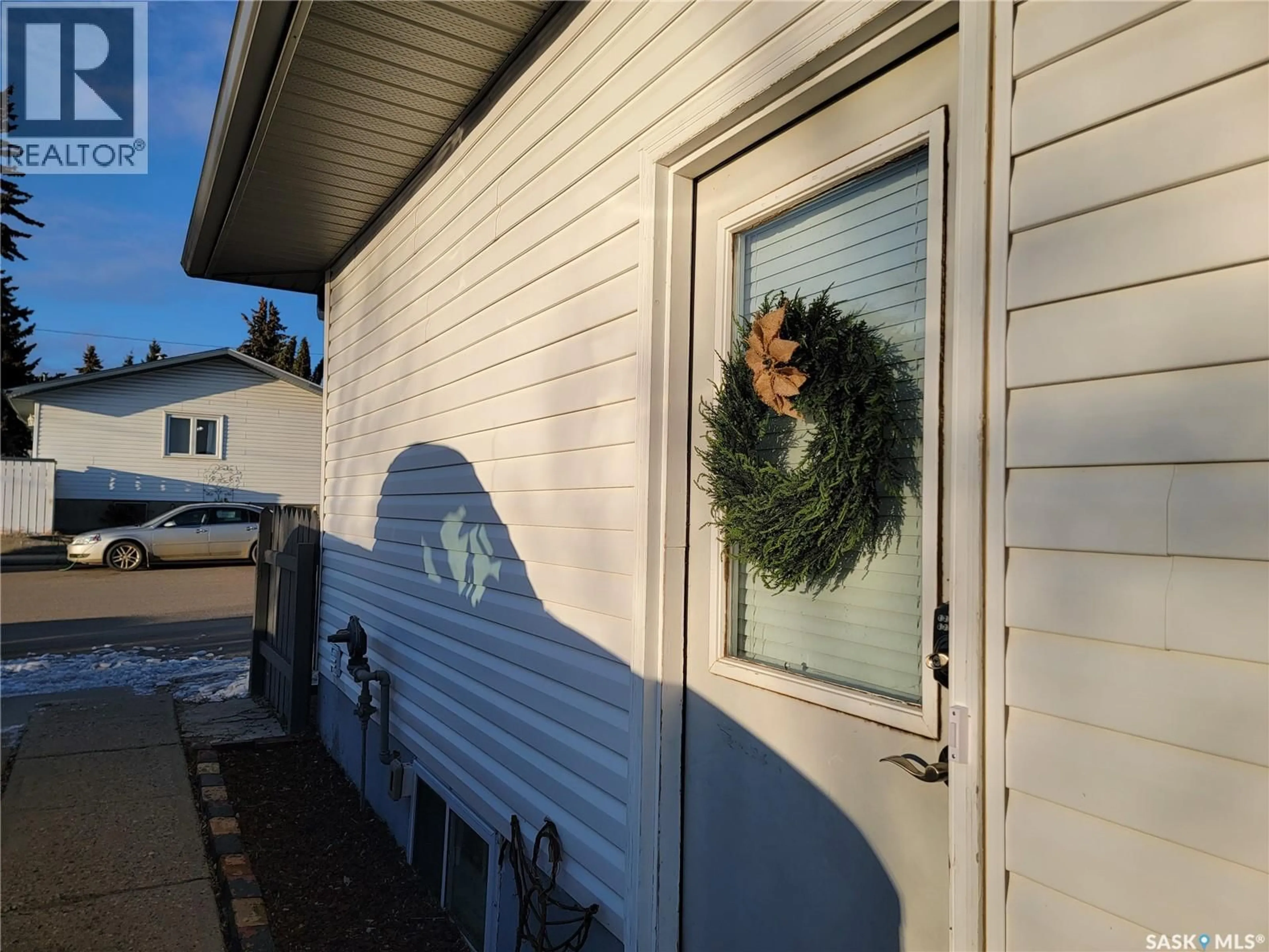 Home with vinyl exterior material, street for 4812 POST STREET, Macklin Saskatchewan S0L2C0
