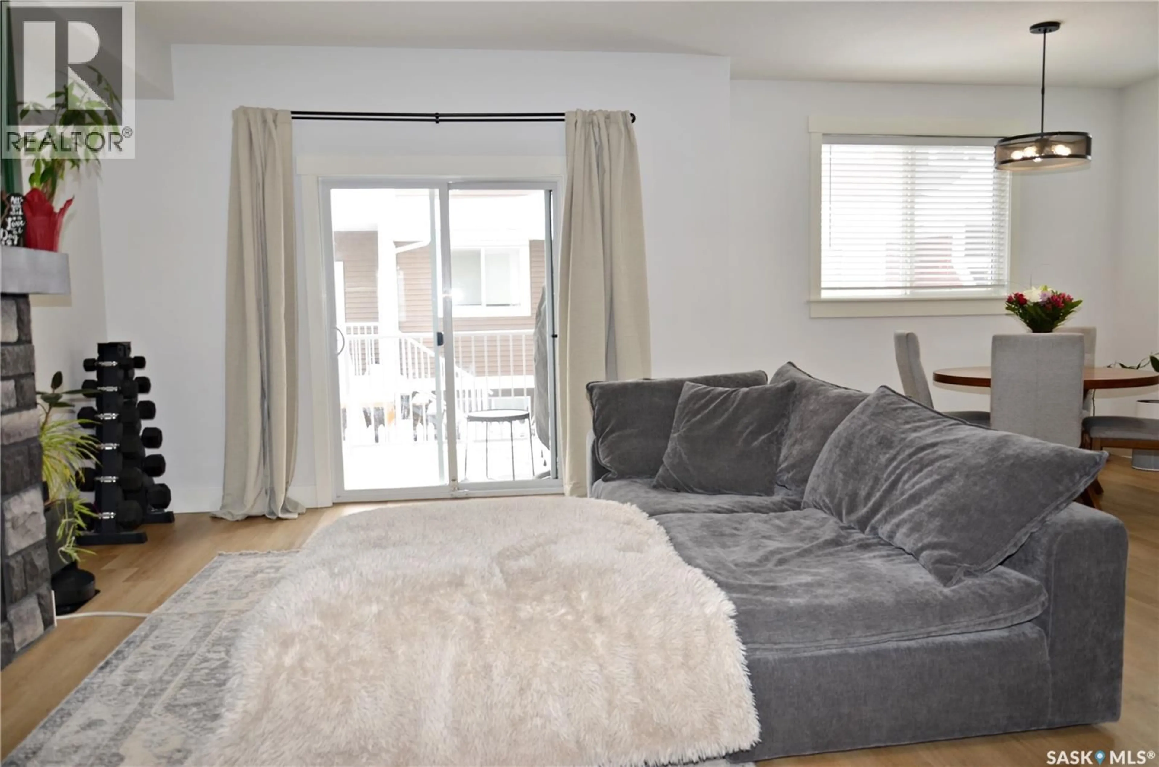 Living room with furniture, unknown for 91 900 ST ANDREWS LANE, Warman Saskatchewan S0K4S4