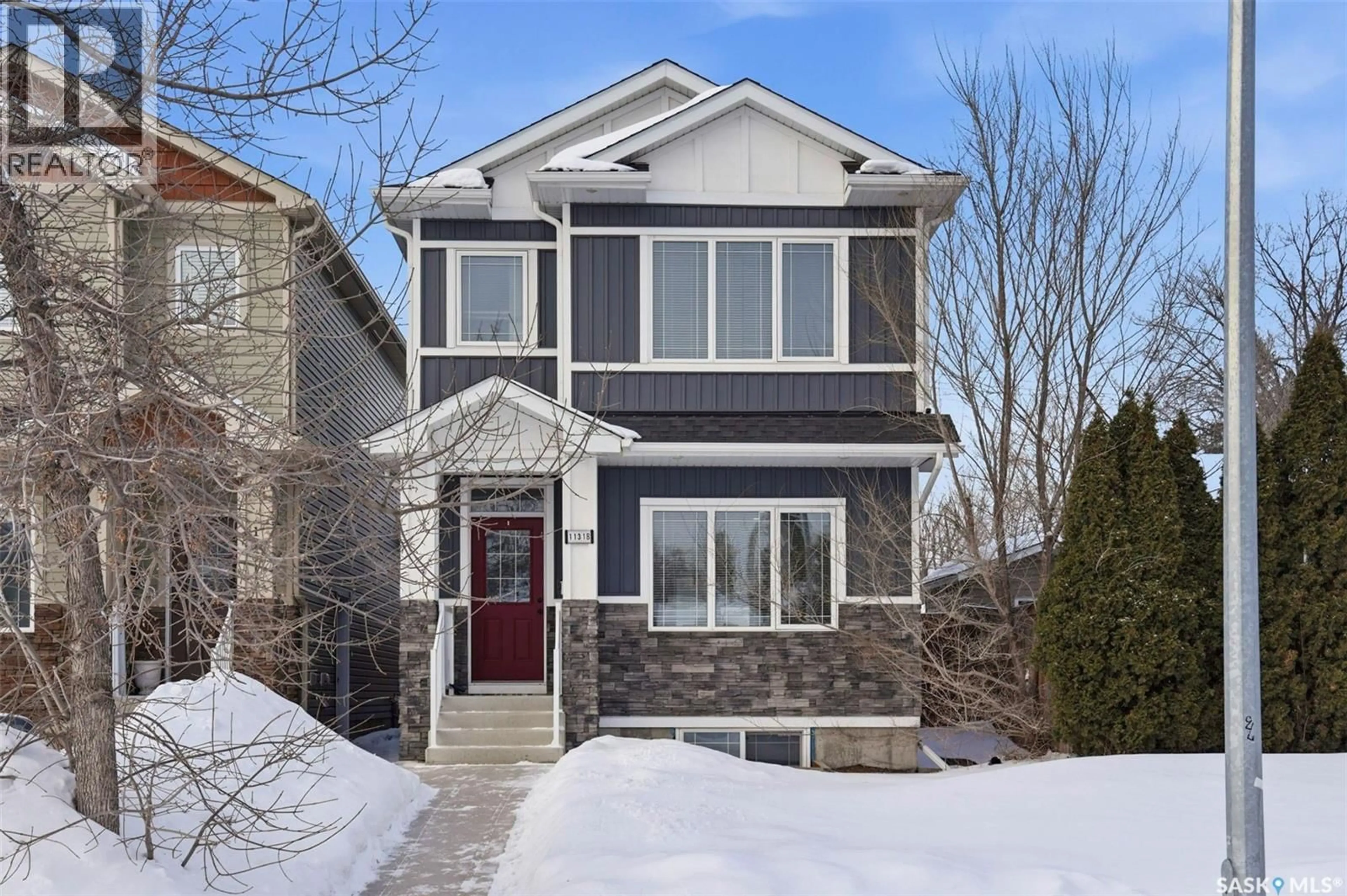 Home with brick exterior material, street for 1131B 6TH STREET, Saskatoon Saskatchewan S7H1E4