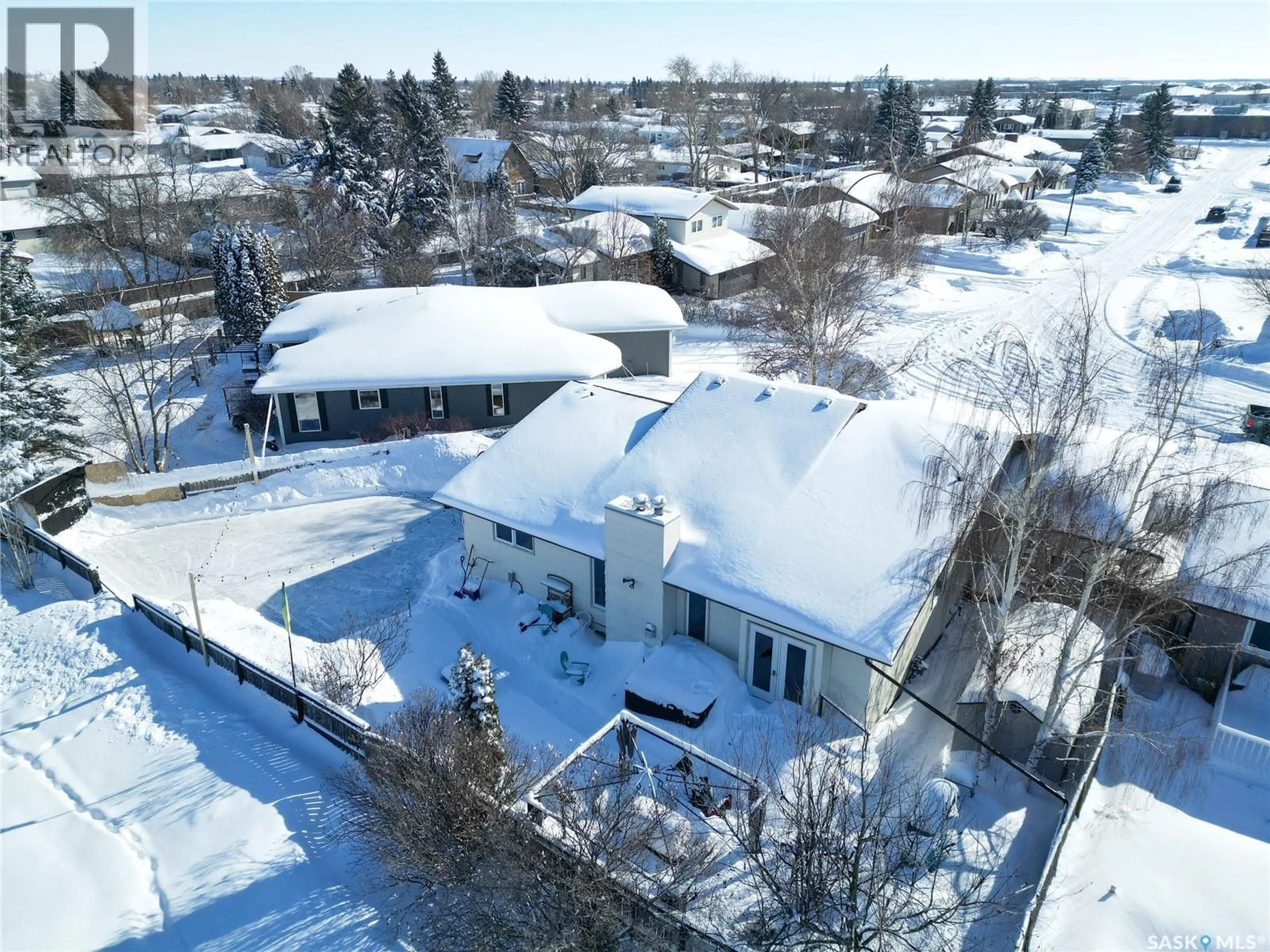 A pic from outside/outdoor area/front of a property/back of a property/a pic from drone, street for 26 BARNES CRESCENT, Humboldt Saskatchewan S0K2A0