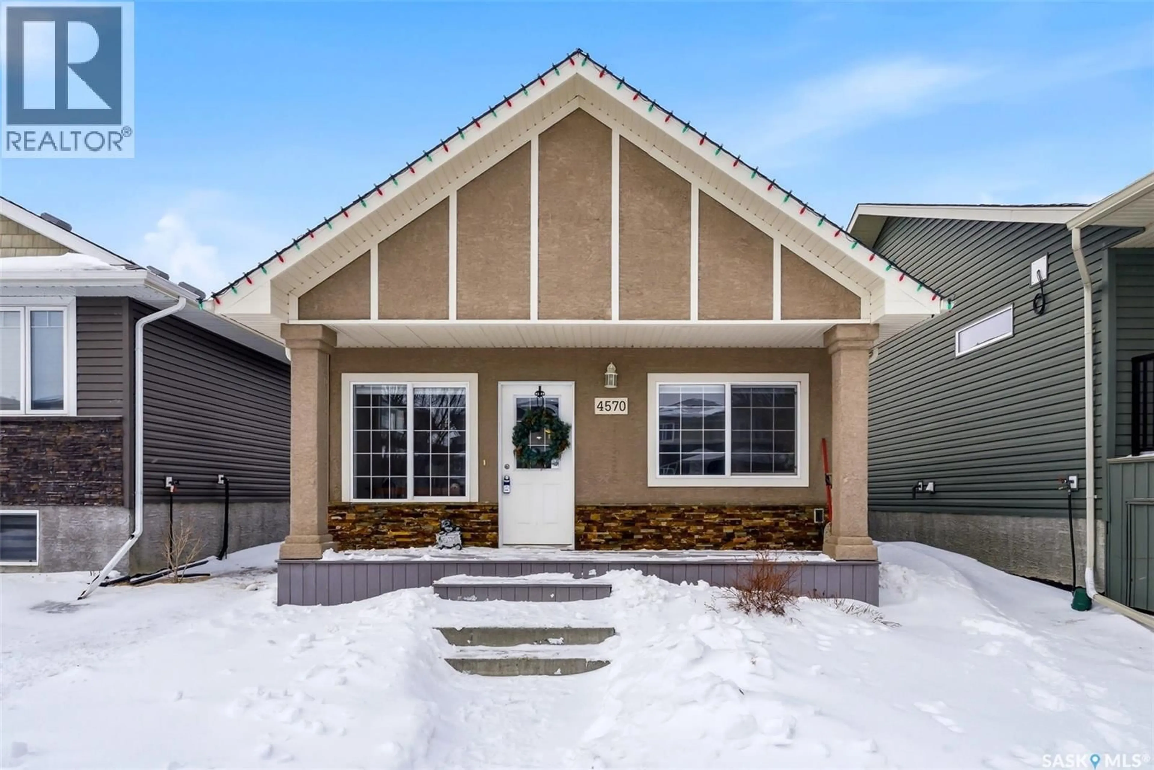 Home with vinyl exterior material, street for 4570 JAMES HILL ROAD, Regina Saskatchewan S4W0K8