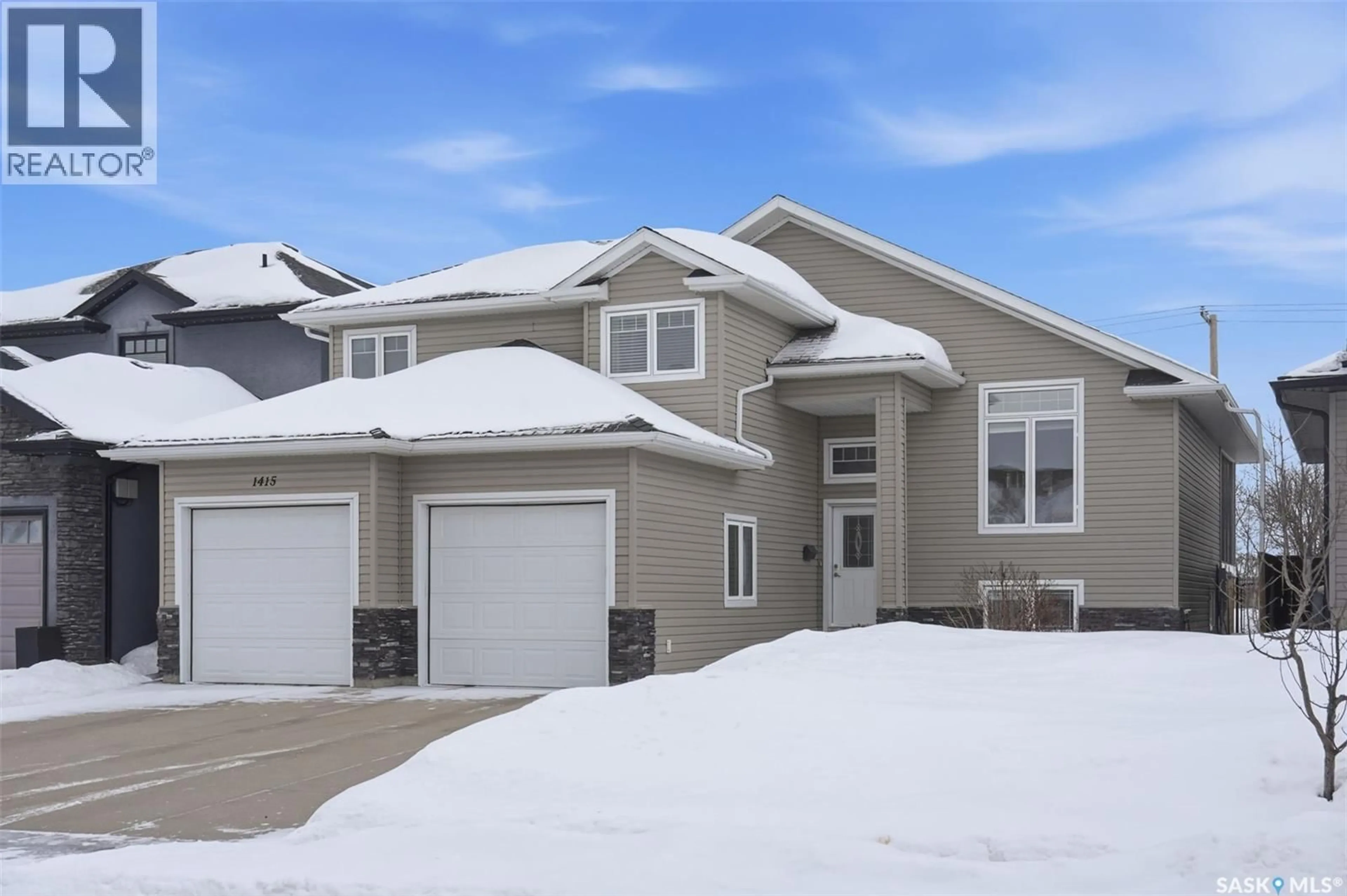 Home with vinyl exterior material, street for 1415 PATON CRESCENT, Saskatoon Saskatchewan S7W0C2