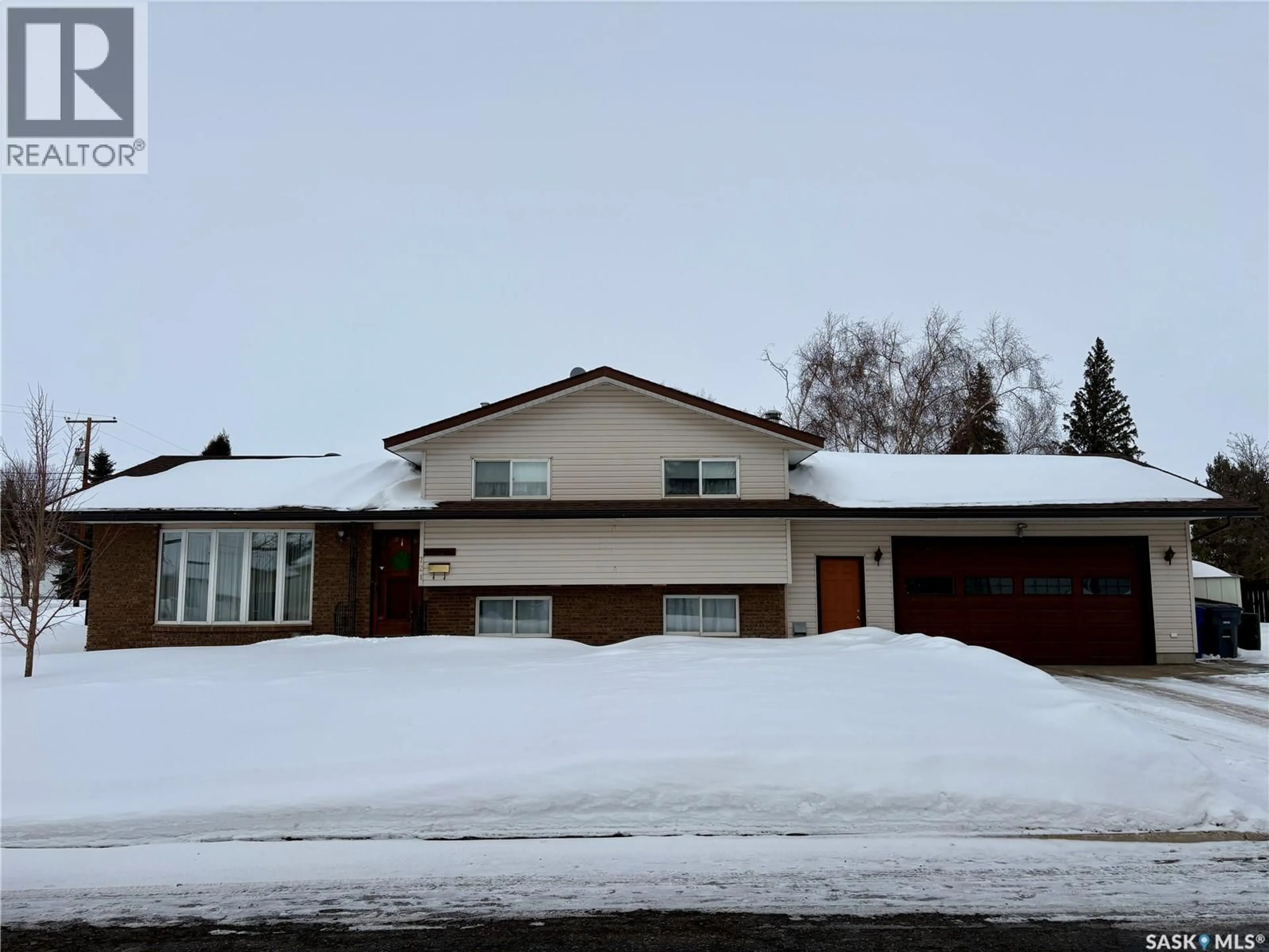 A pic from outside/outdoor area/front of a property/back of a property/a pic from drone, street for 721 6TH AVENUE, Rosthern Saskatchewan S0K3R0